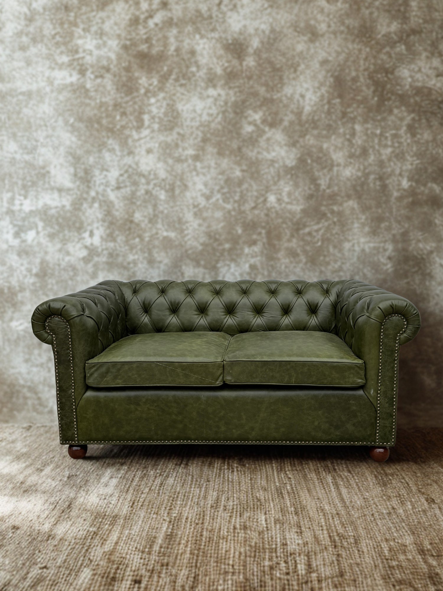 Chesterfield sofa button tufting detail — Art Avenue