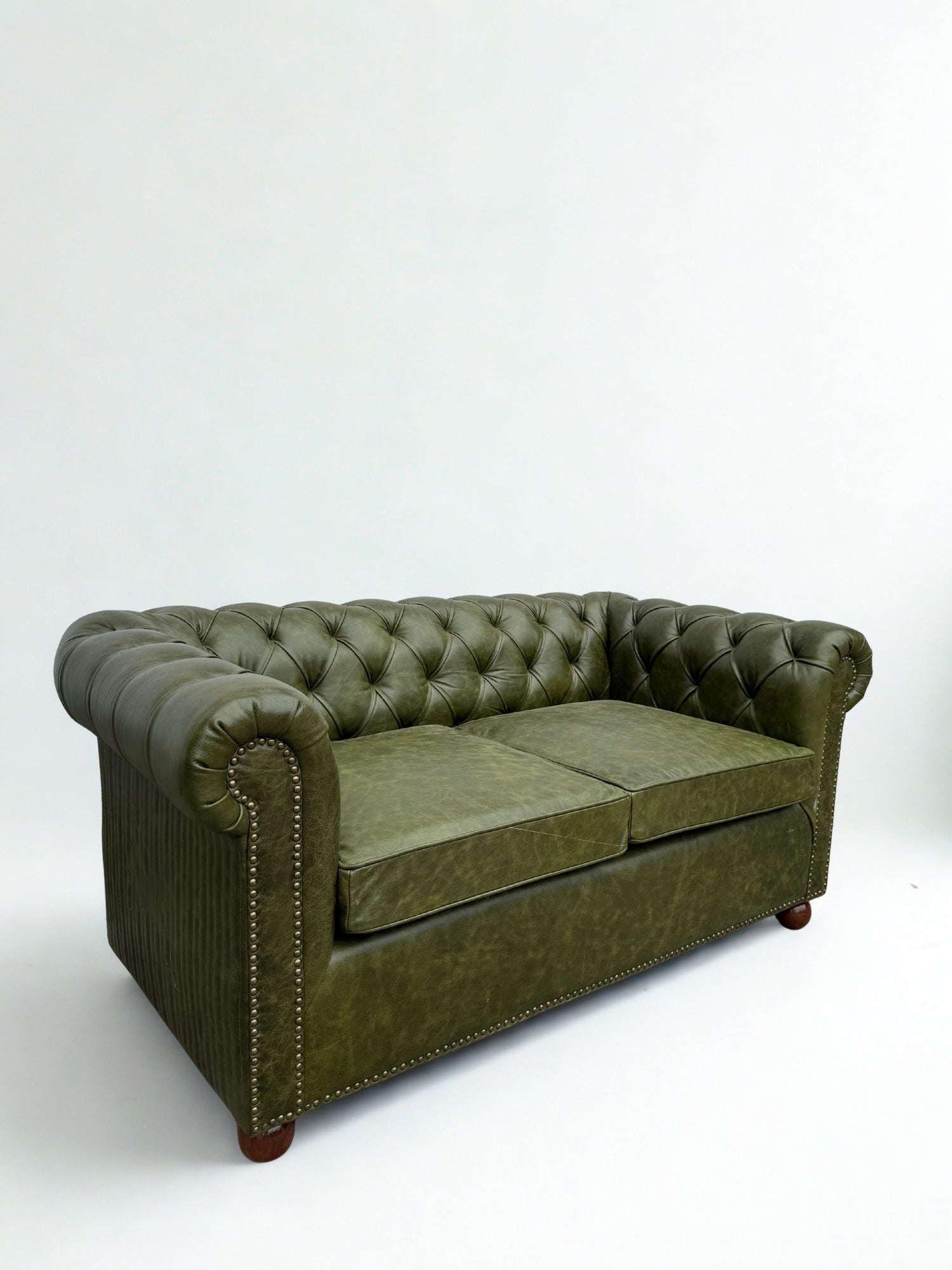 Eleanor leather chesterfield sofa — front view — Art Avenue