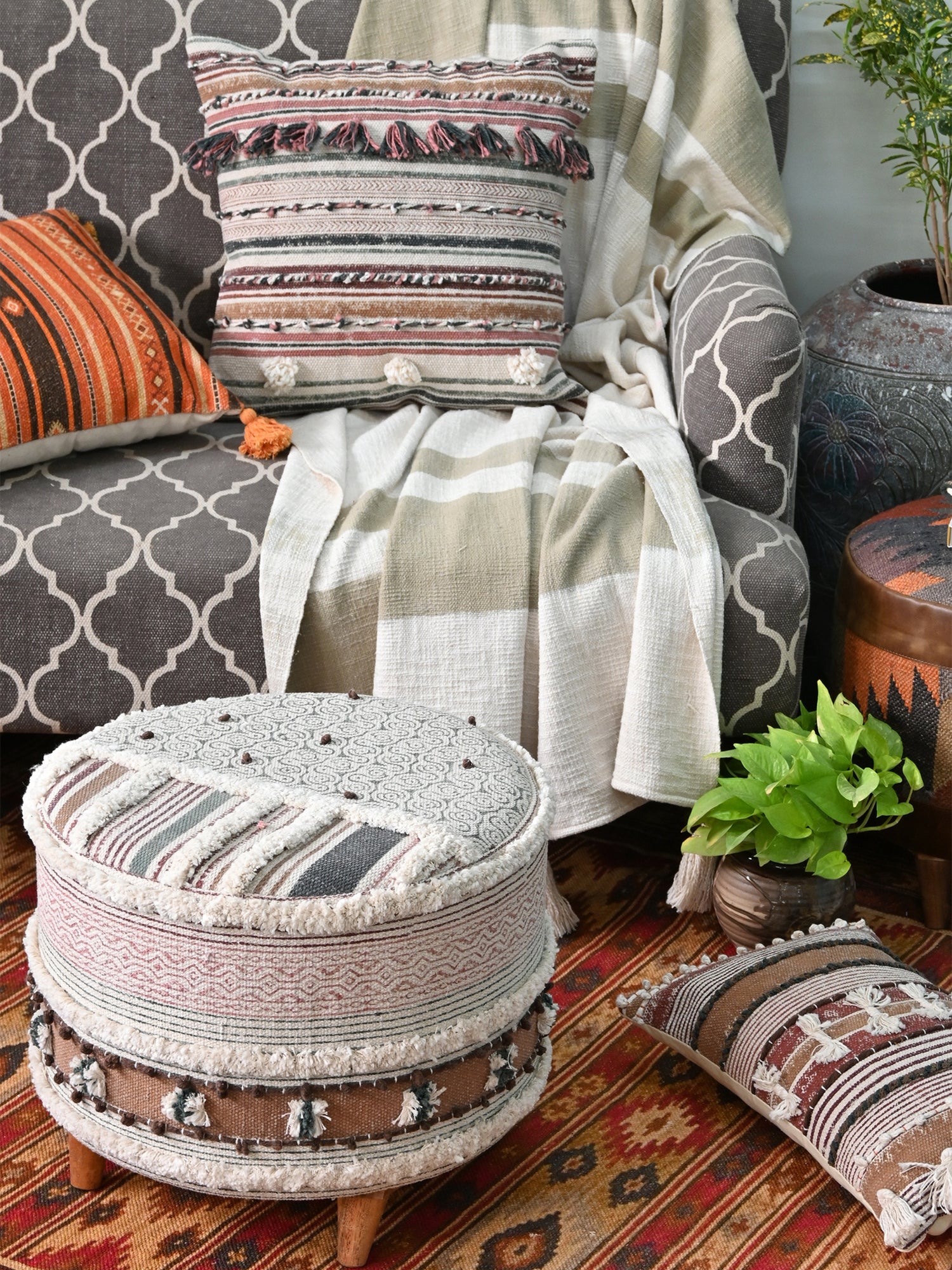 Kilim-Upholstered Cylindrical Ottoman in Brown — Art Avenue