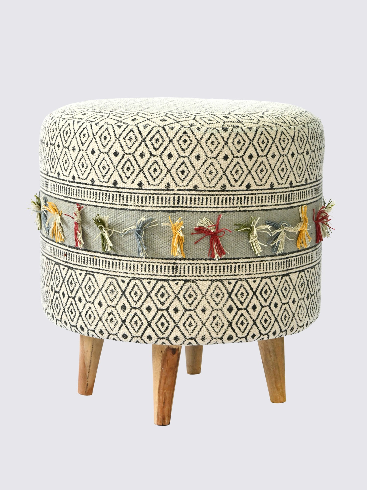 Side view of kilim cylindrical ottoman in brown — Art Avenue