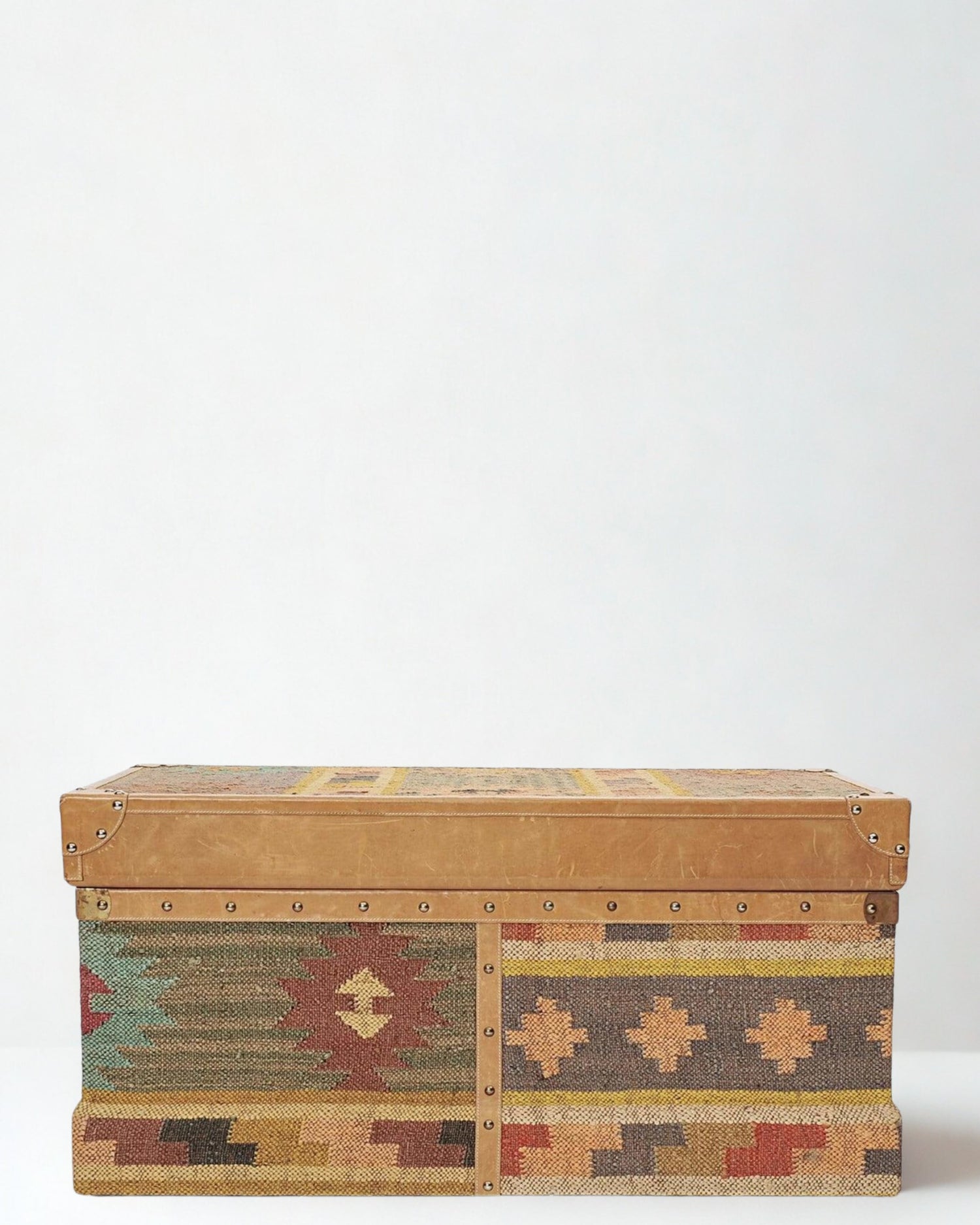 Kilim trunk lid and leather trim detail — Art Avenue