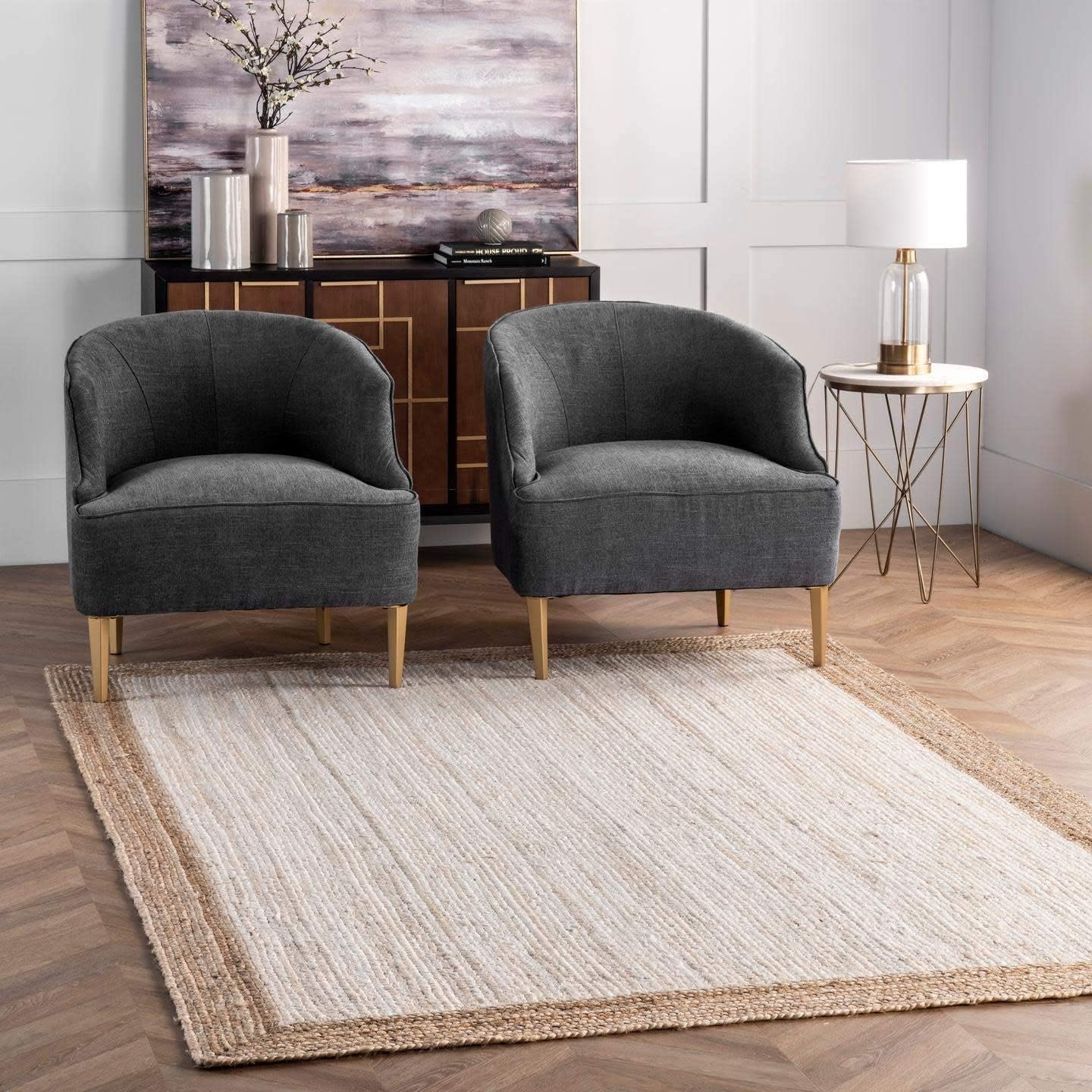 Empty braided jute rug room setting — Art Avenue