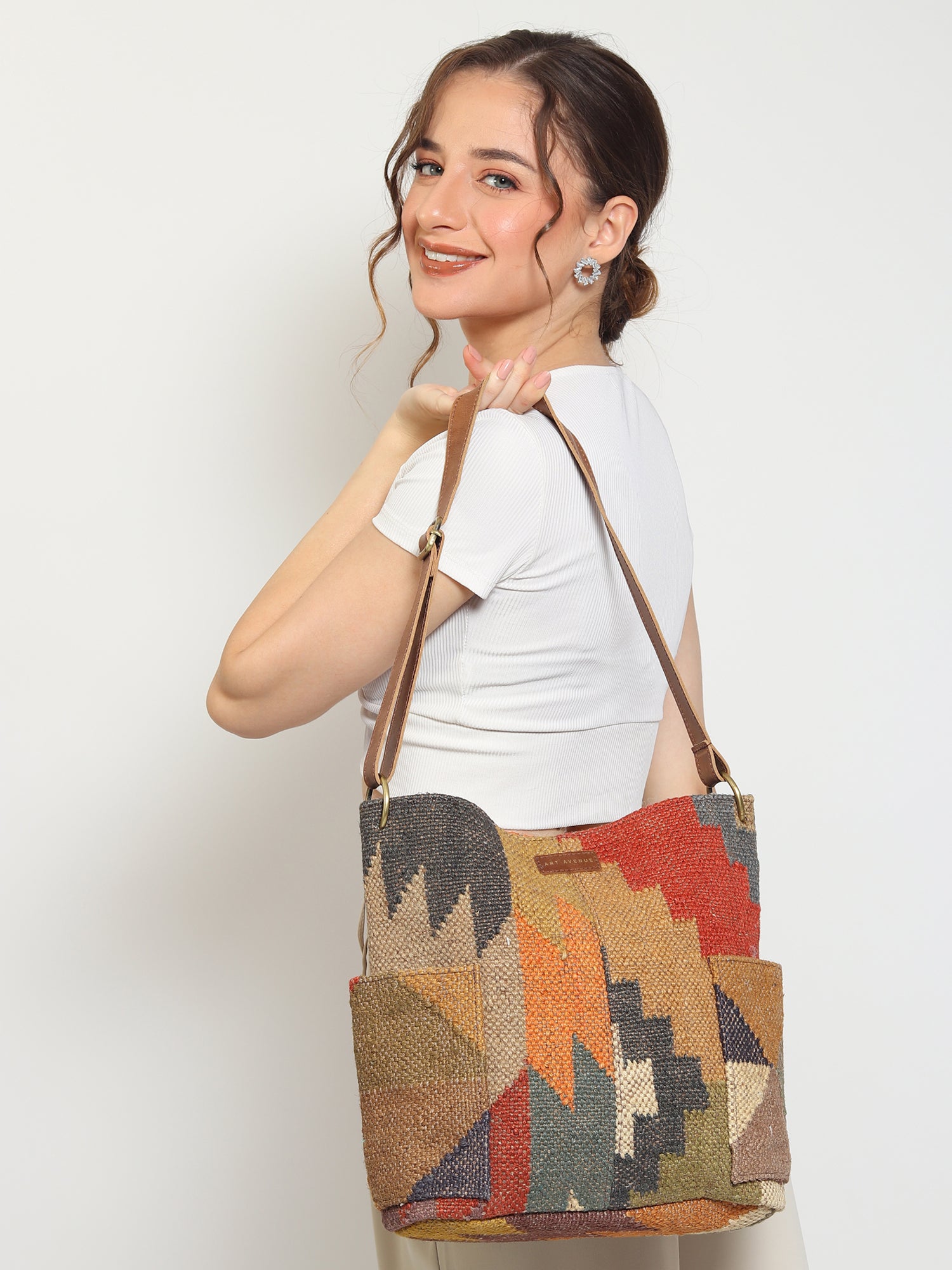 Doodle kilim and leather handbag, side view — Art Avenue