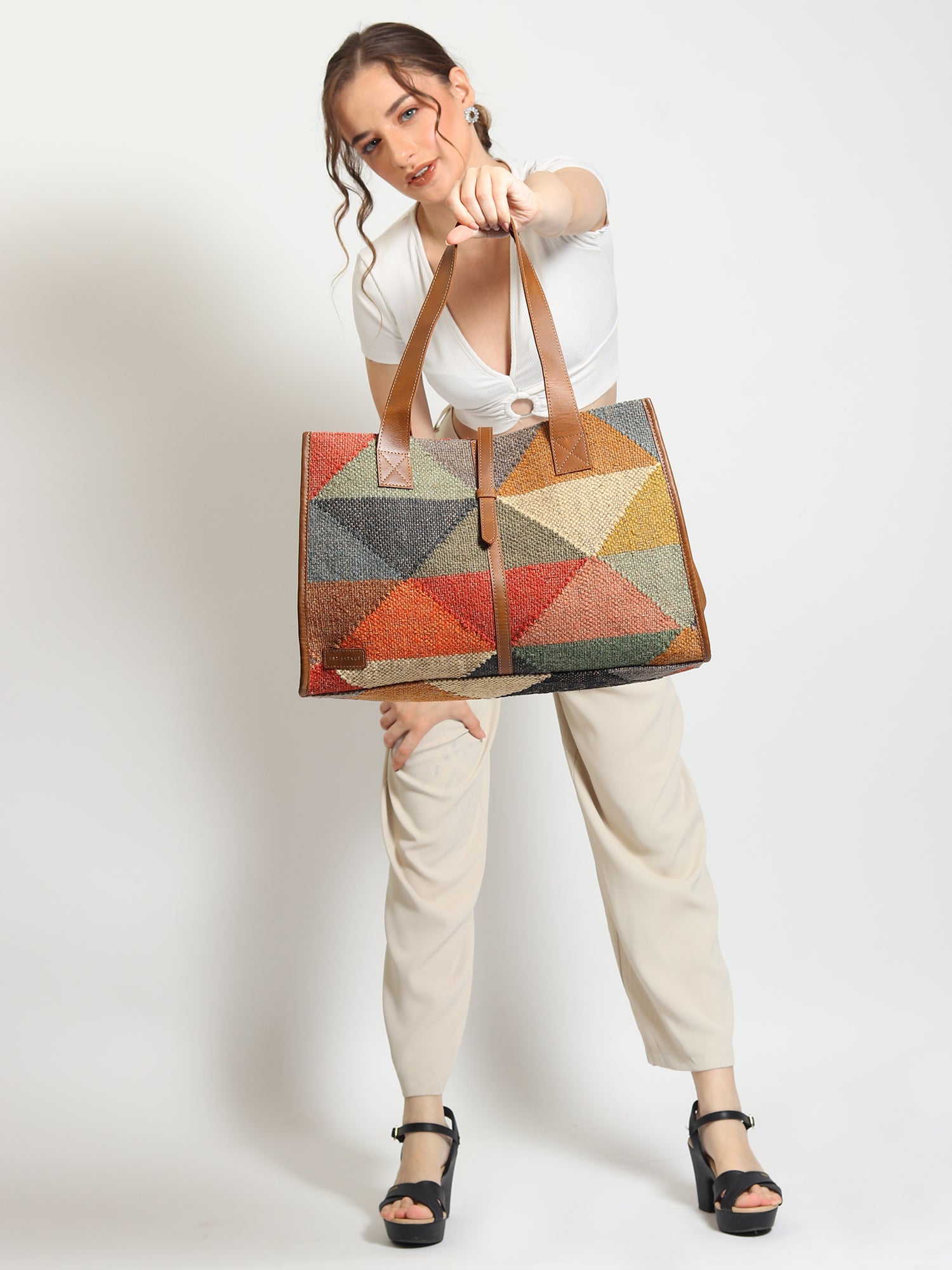 Umbra kilim and leather handbag, side view — Art Avenue