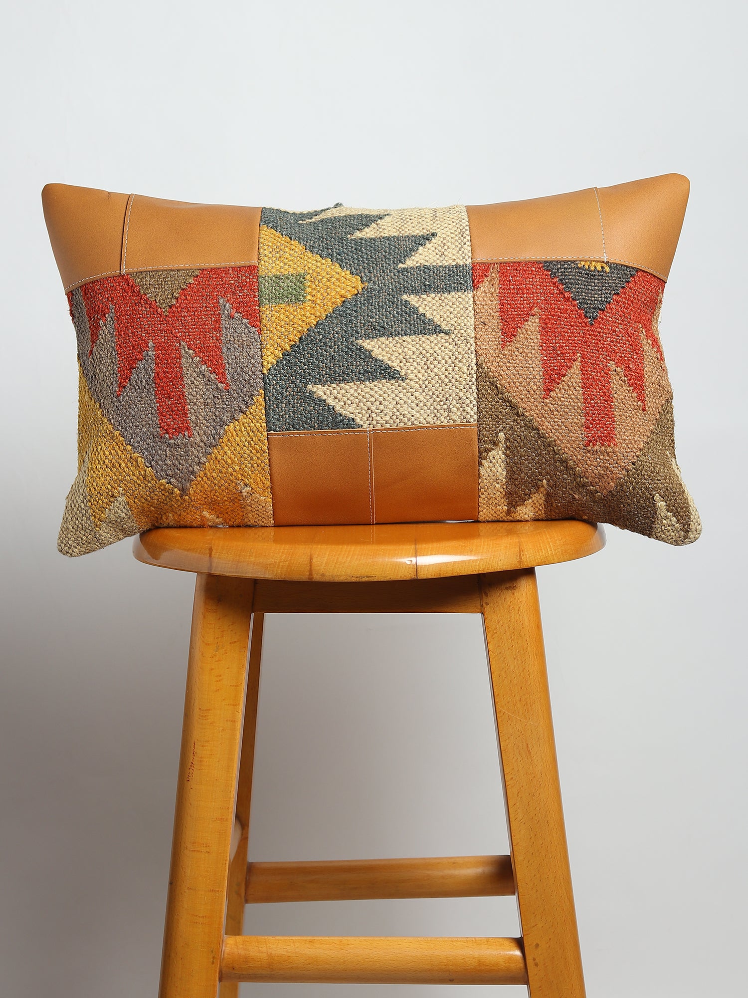 Musky kilim lumbar cushion on sofa — Art Avenue