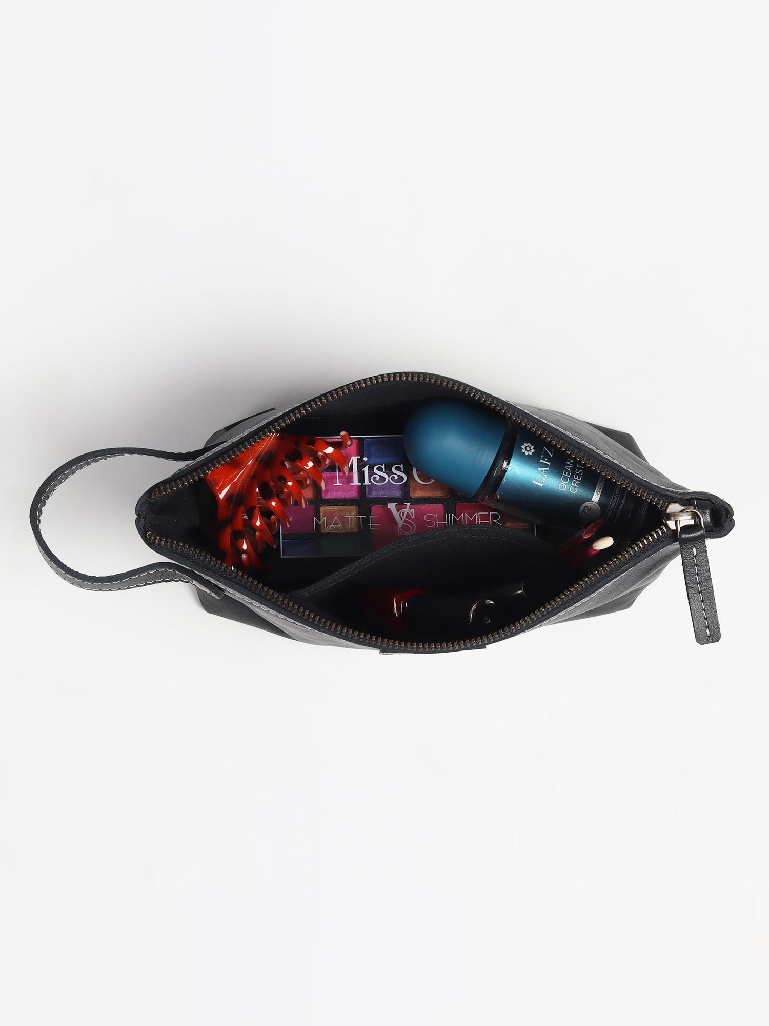 Flisk leather pouch closure detail — Art Avenue