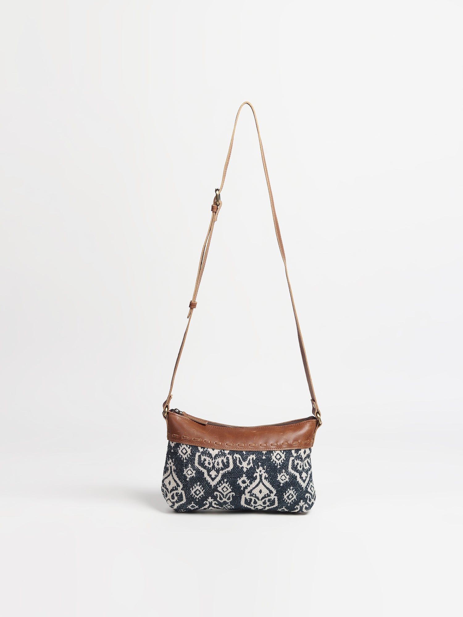 Ava leather and printed fabric sling bag — Art Avenue