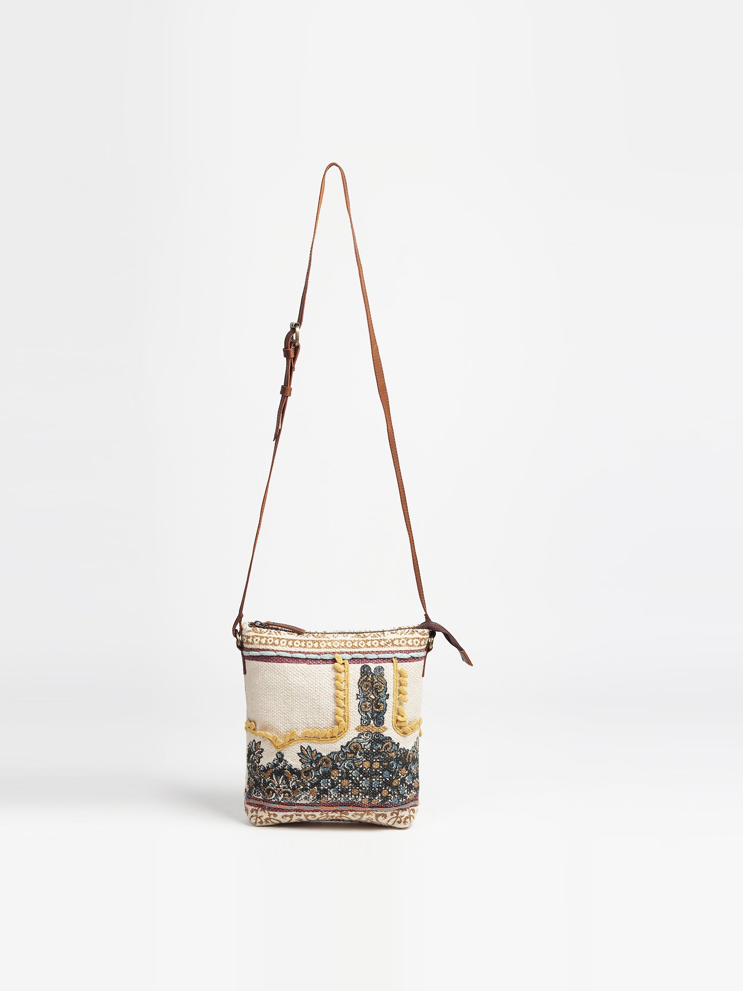 Ifaion leather sling bag, side view — Art Avenue