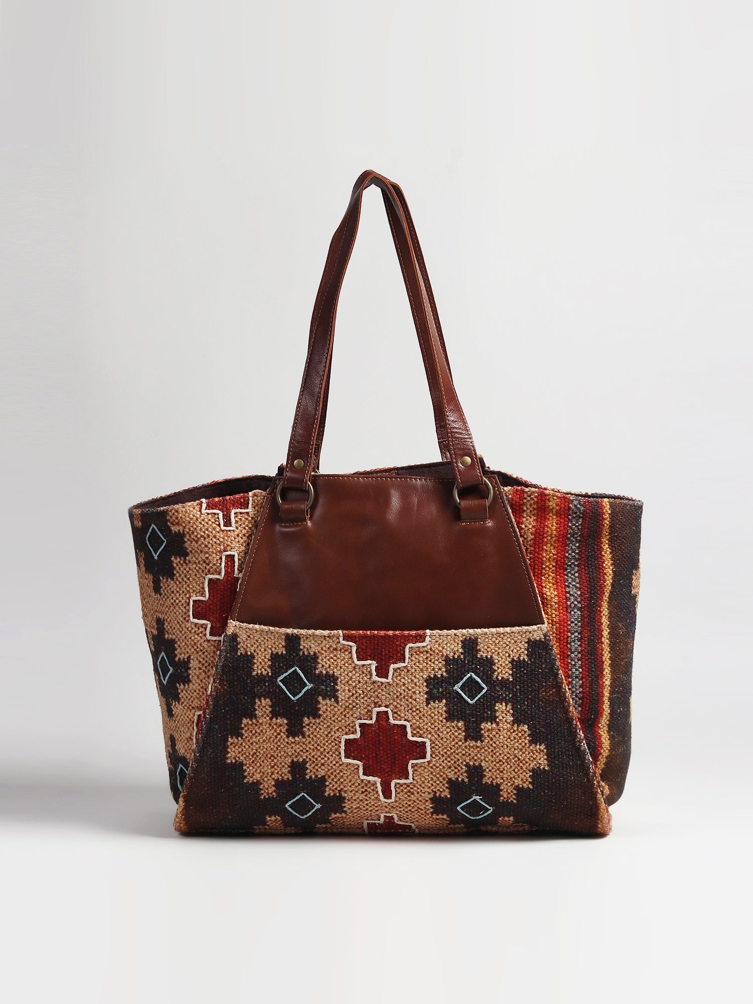 Zemin printed kilim handbag on model — Art Avenue