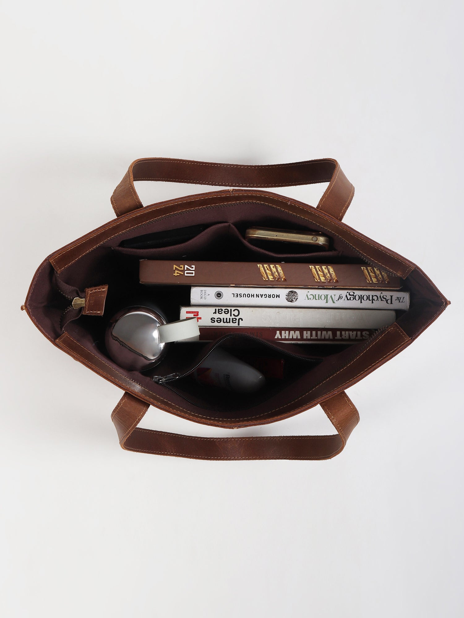 Ezra leather handbag flat lay — Art Avenue