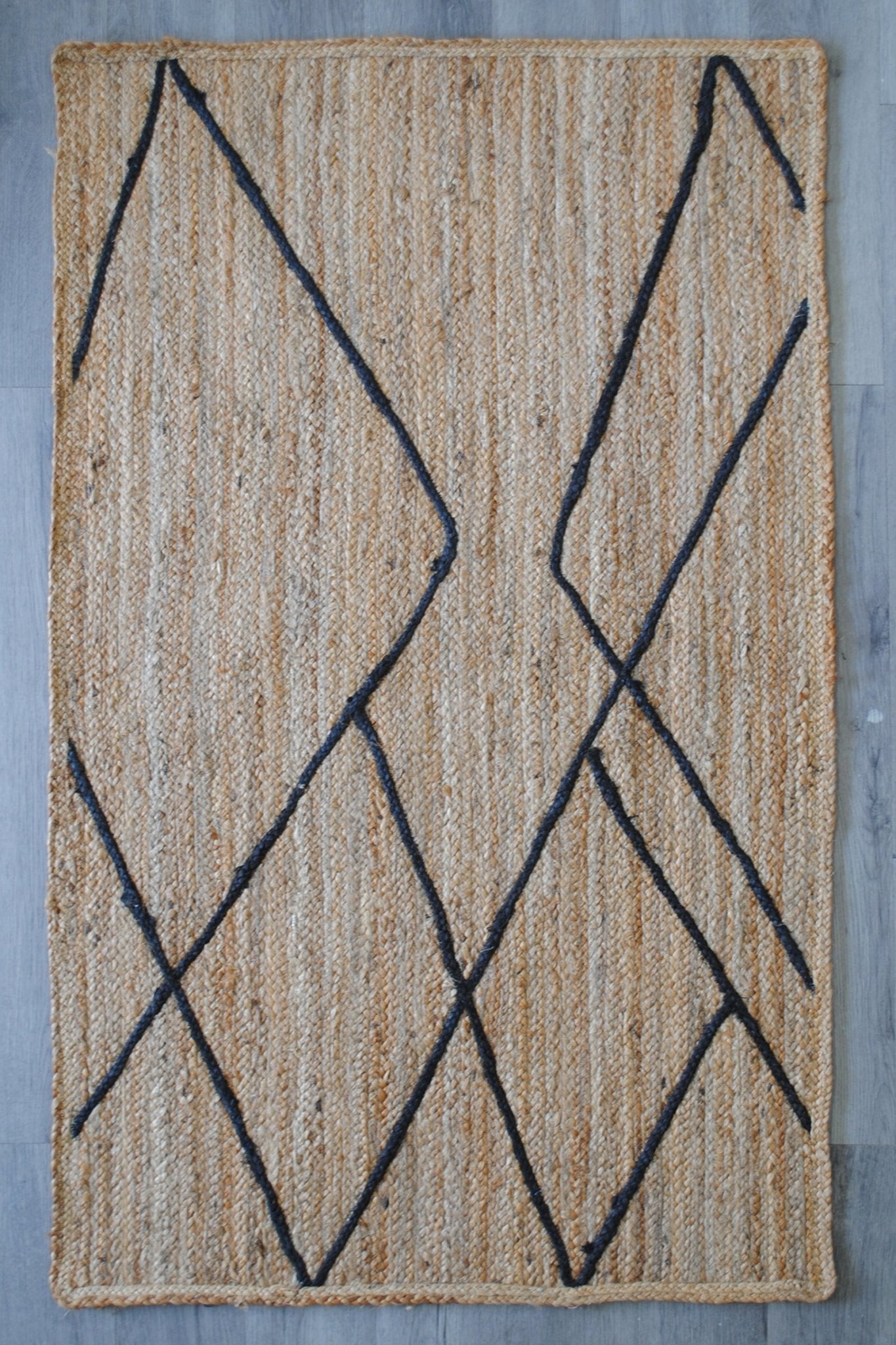 Ariana braided jute rug — Art Avenue