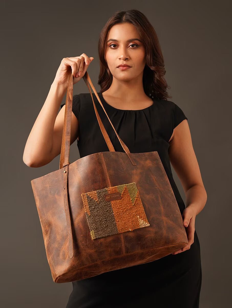 Avarice leather tote bag hardware detail — Art Avenue