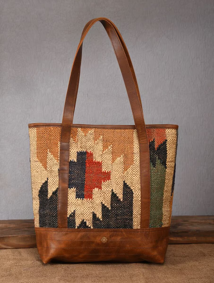 Aneur kilim and leather handbag, front view — Art Avenue
