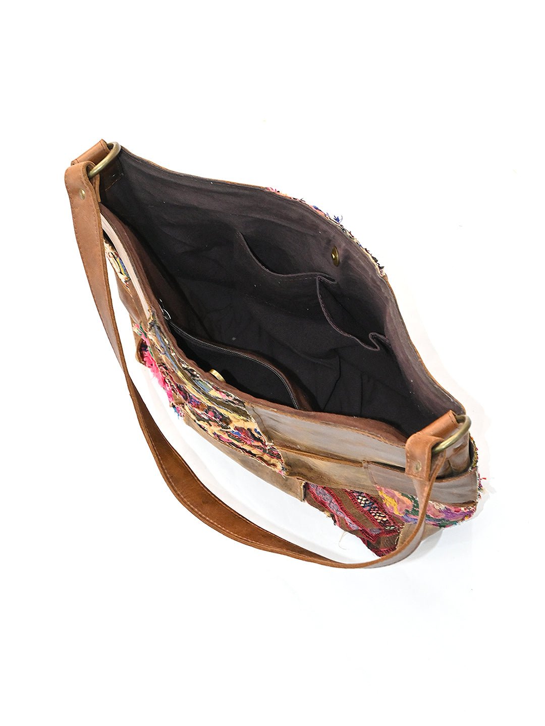Vagator vintage leather patchwork handbag flat lay — Art Avenue