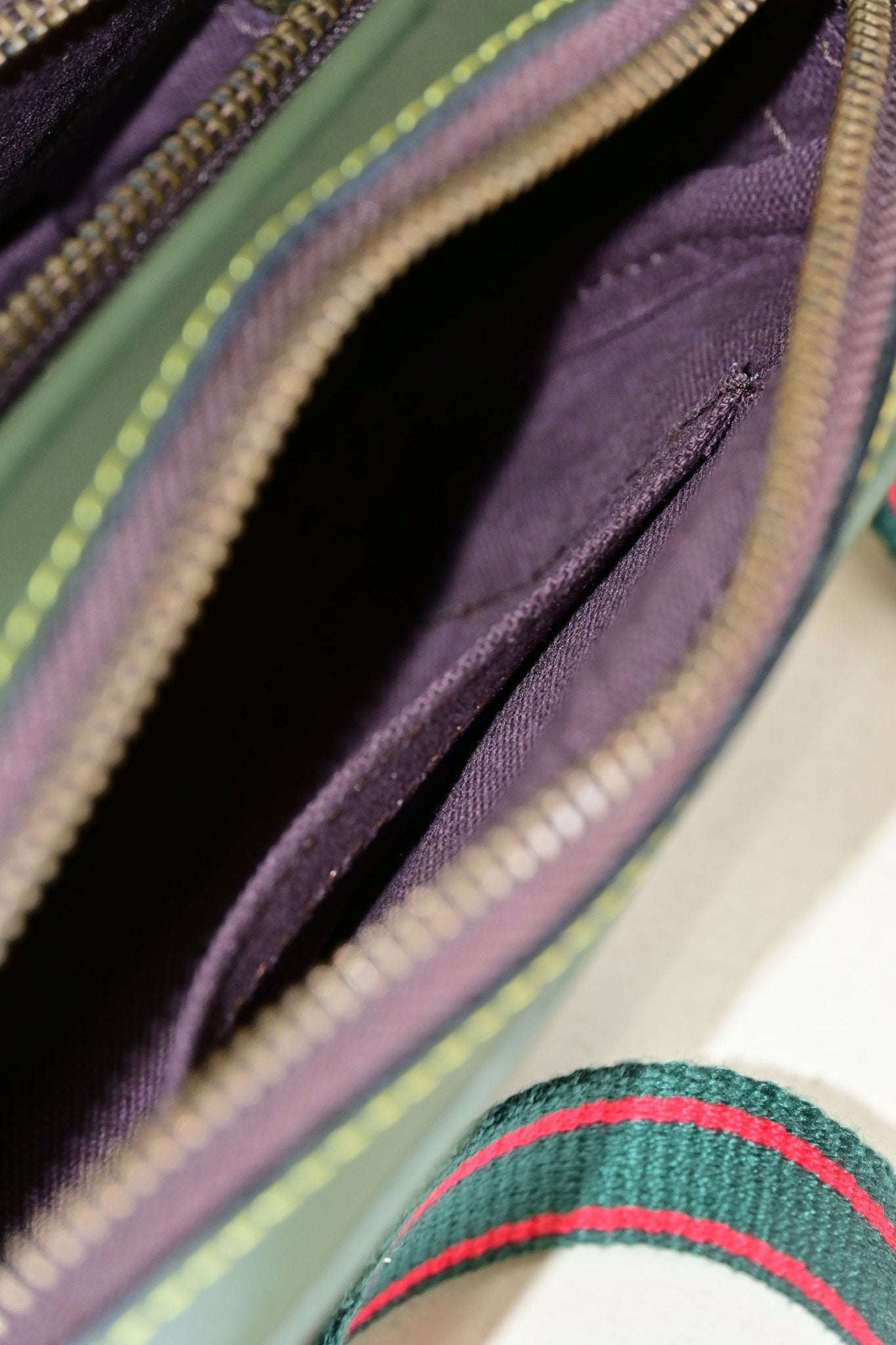 Harisson green sling bag closure detail — Art Avenue