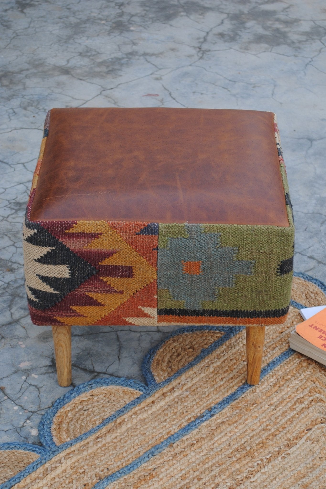 Revere kilim and leather ottoman detail — Art Avenue