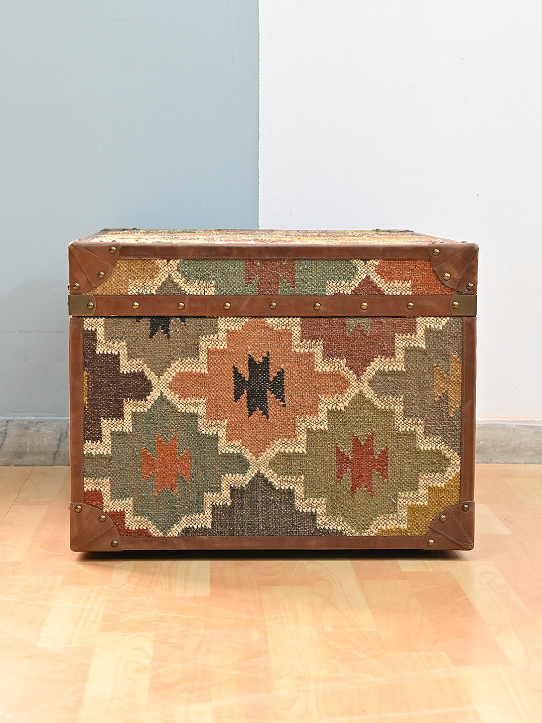 Handcrafted kilim and leather trunk table — Art Avenue