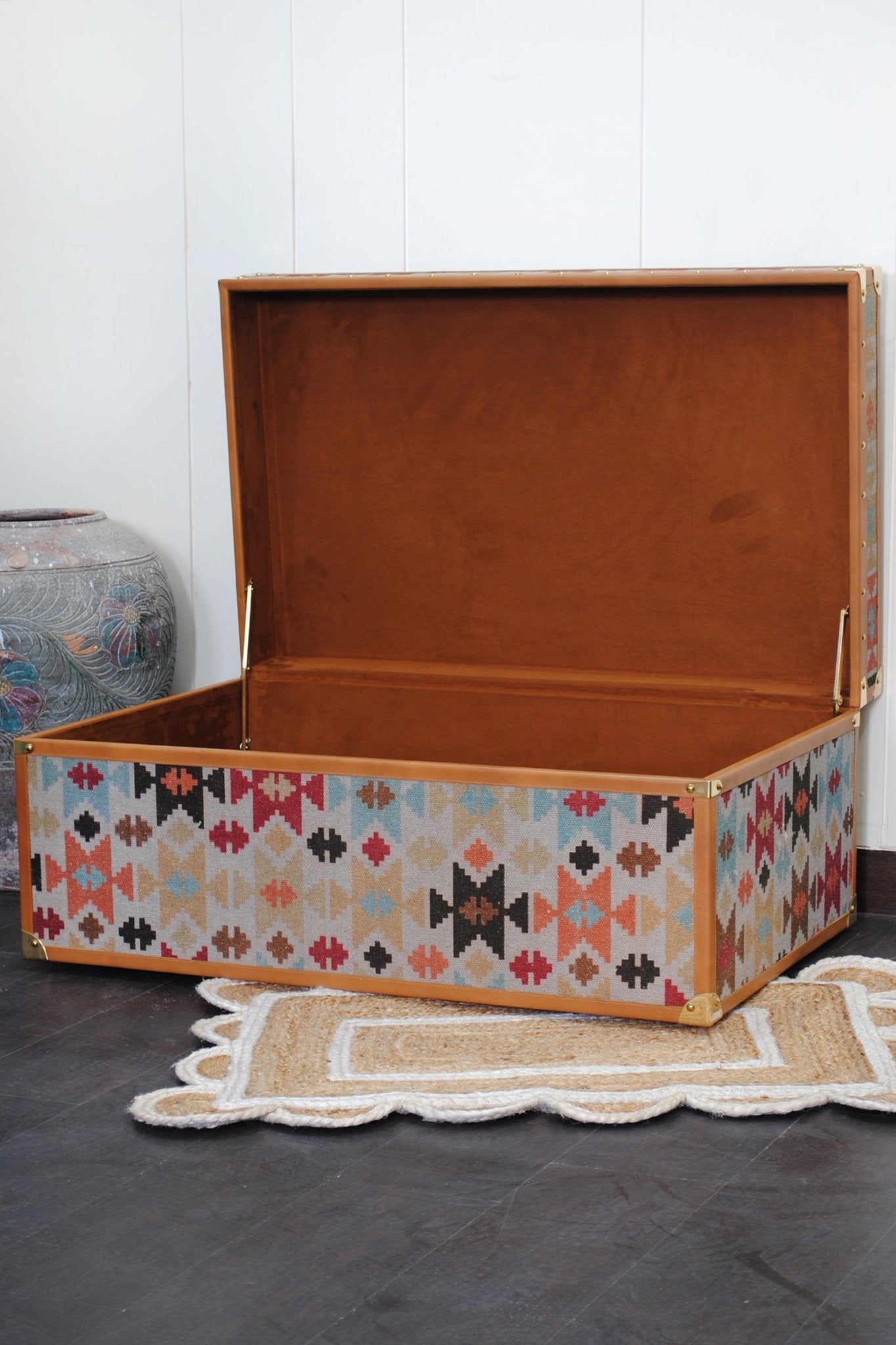Aztec kilim trunk room setting — Art Avenue Jaipur