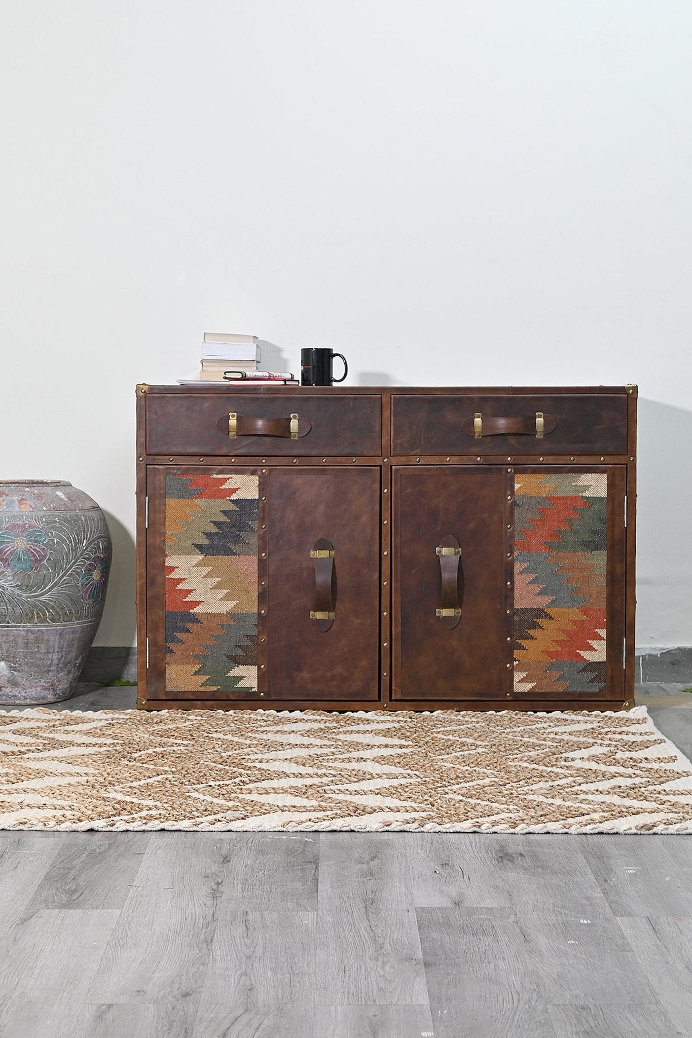 Side view of kilim and leather chest of drawers — Art Avenue