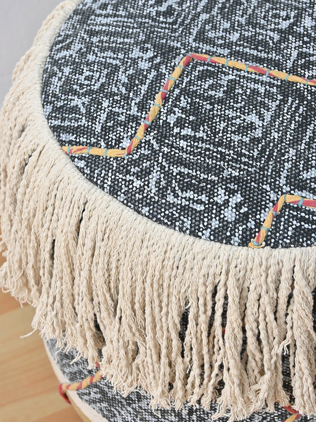 Side view of kilim cylindrical ottoman — Art Avenue