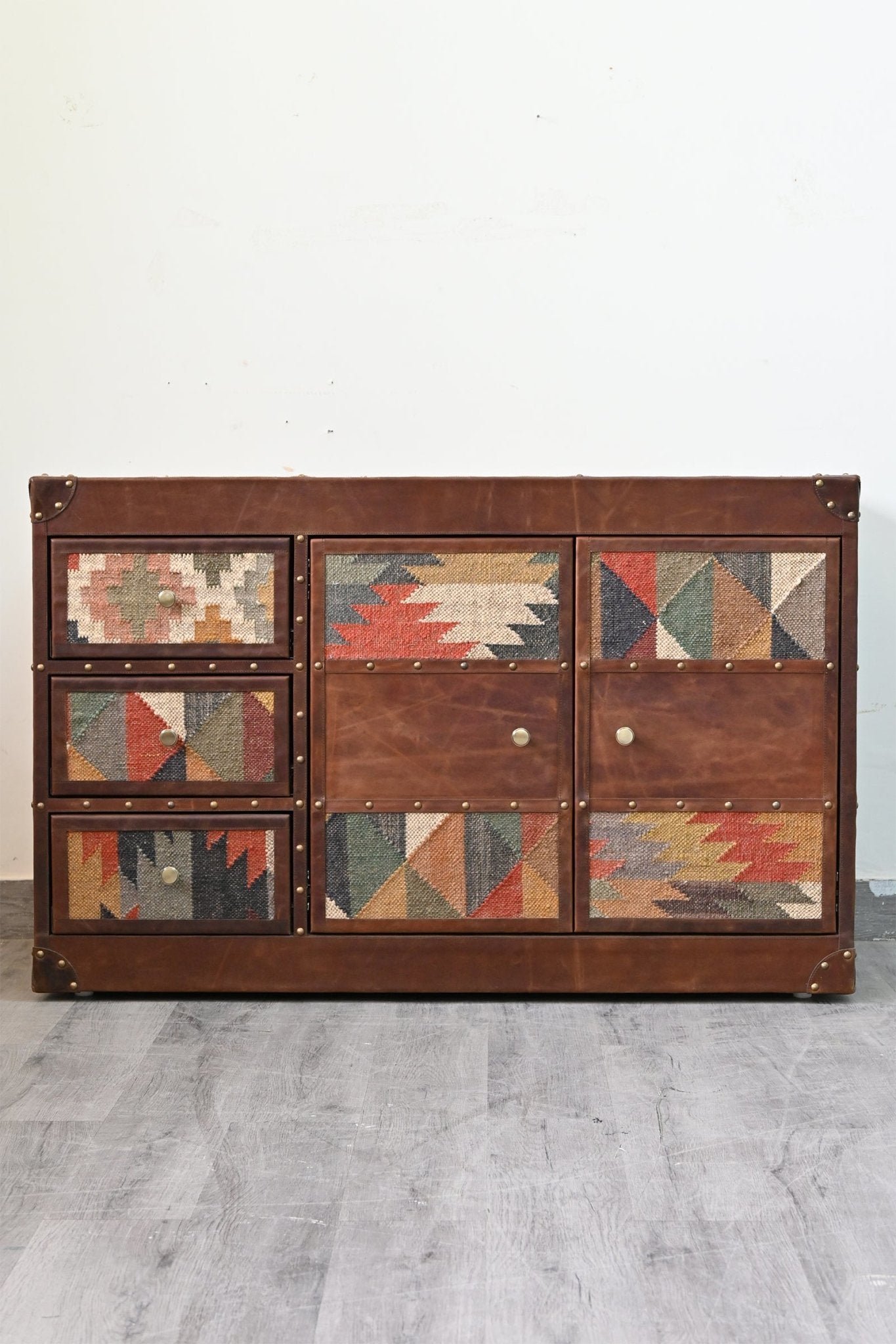 Side view of kilim and leather chest of drawers — Art Avenue