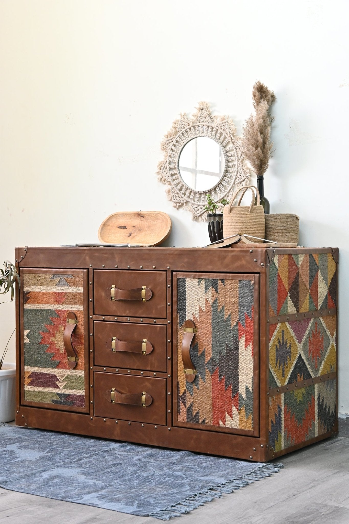 Side view of kilim and leather chest of drawers — Art Avenue