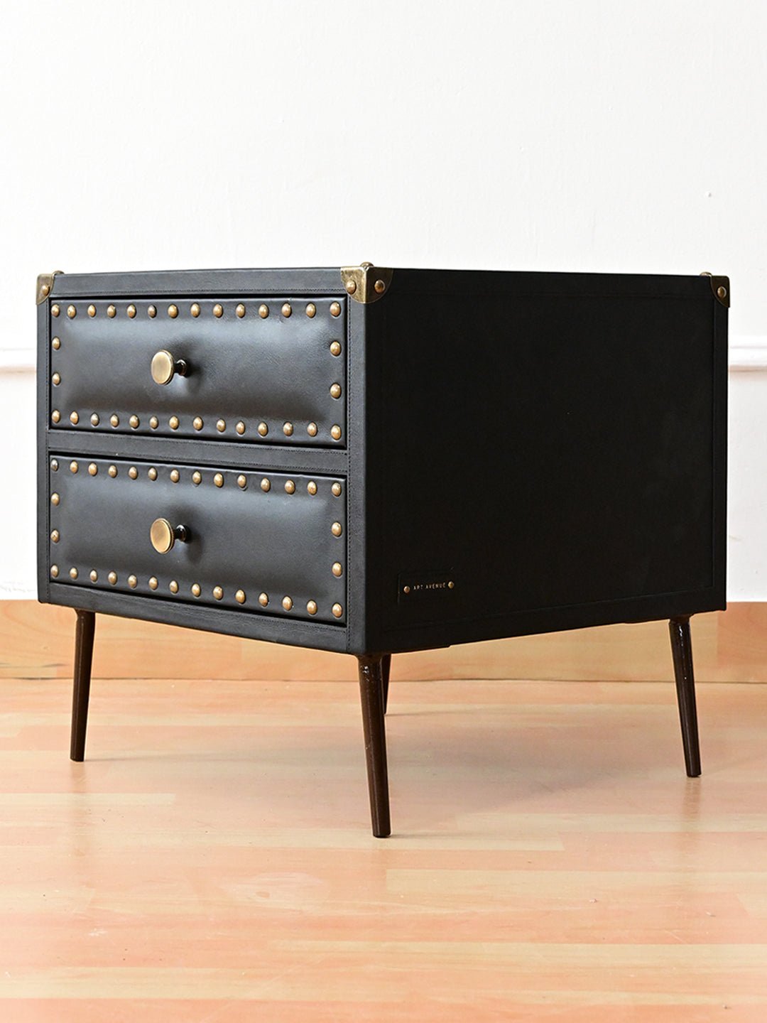 Side view of leather side table — Art Avenue