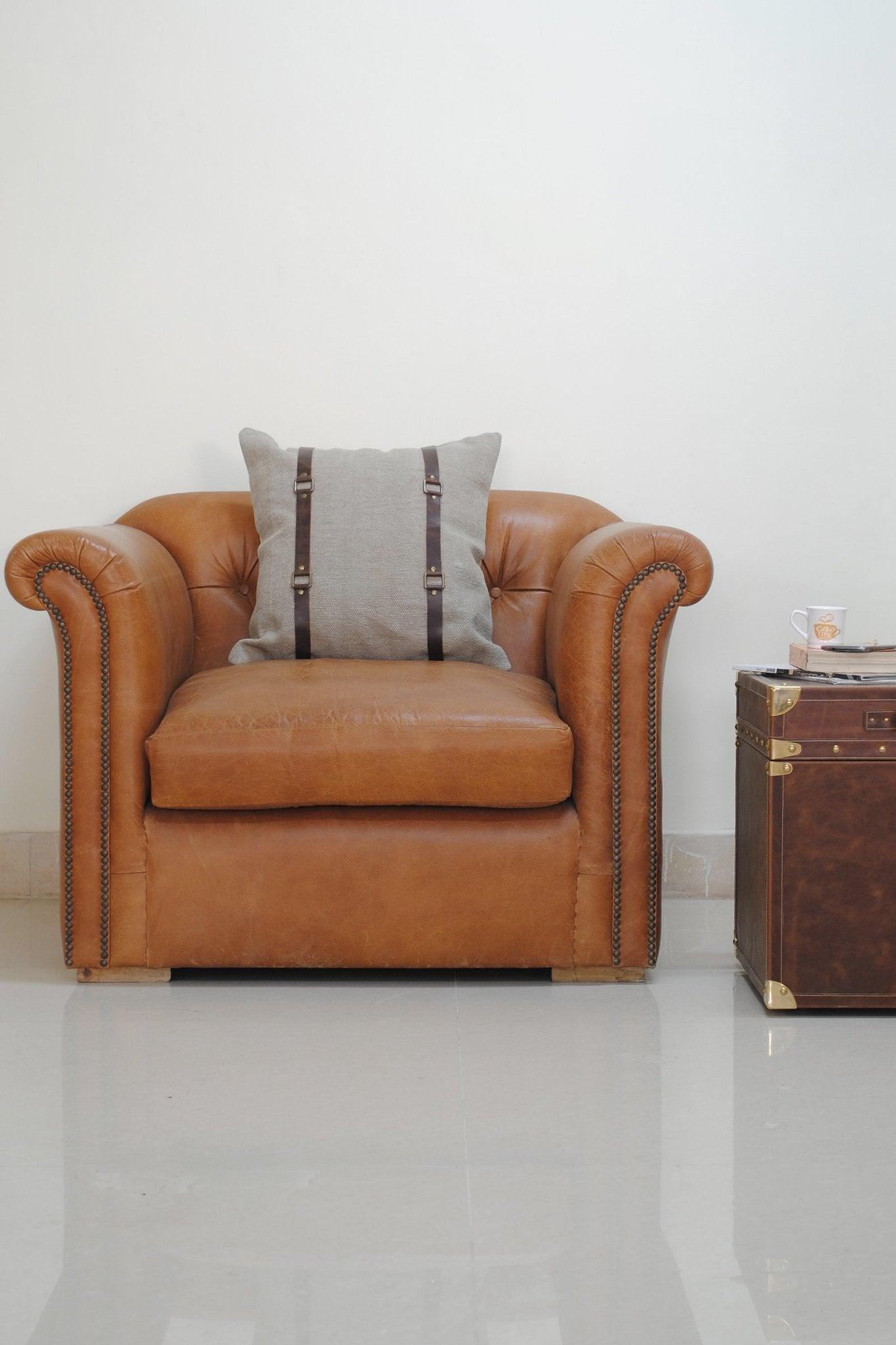 Side view of leather wing back armchair — Art Avenue