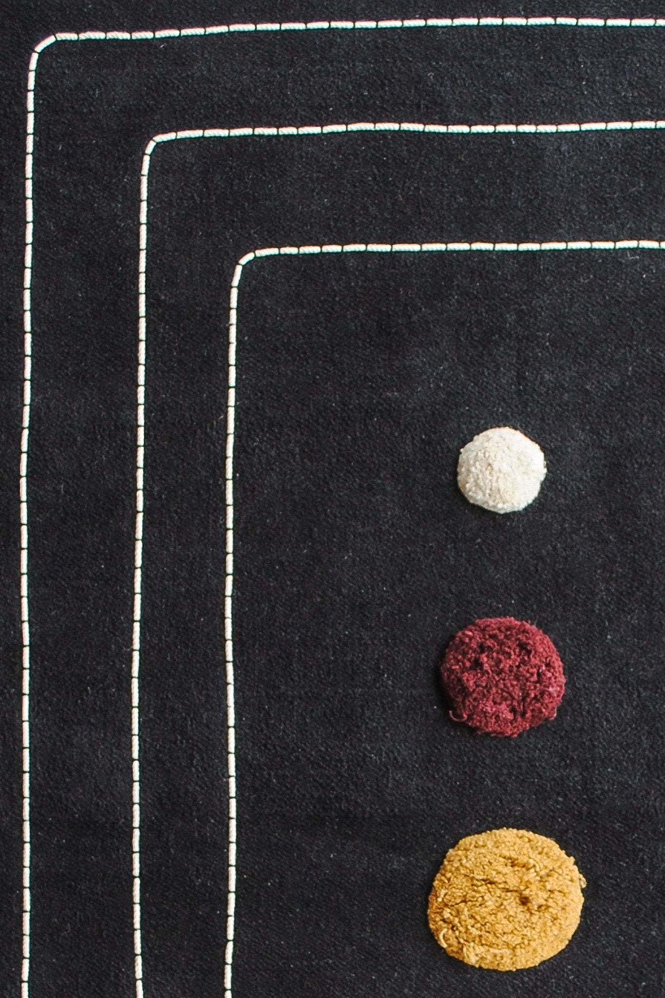 Bloom embroidered rug black detail — Art Avenue Jaipur