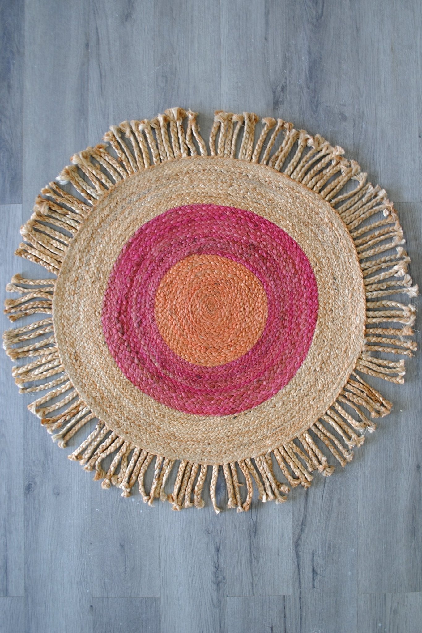 Carmine round jute rug room setting — Art Avenue India