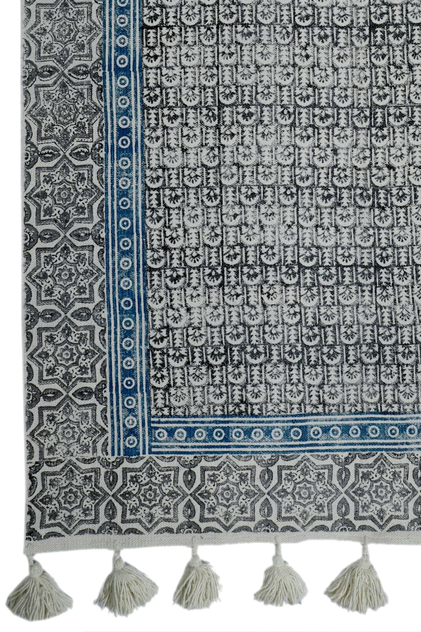 Block-printed cotton dhurrie rug in room setting — Art Avenue