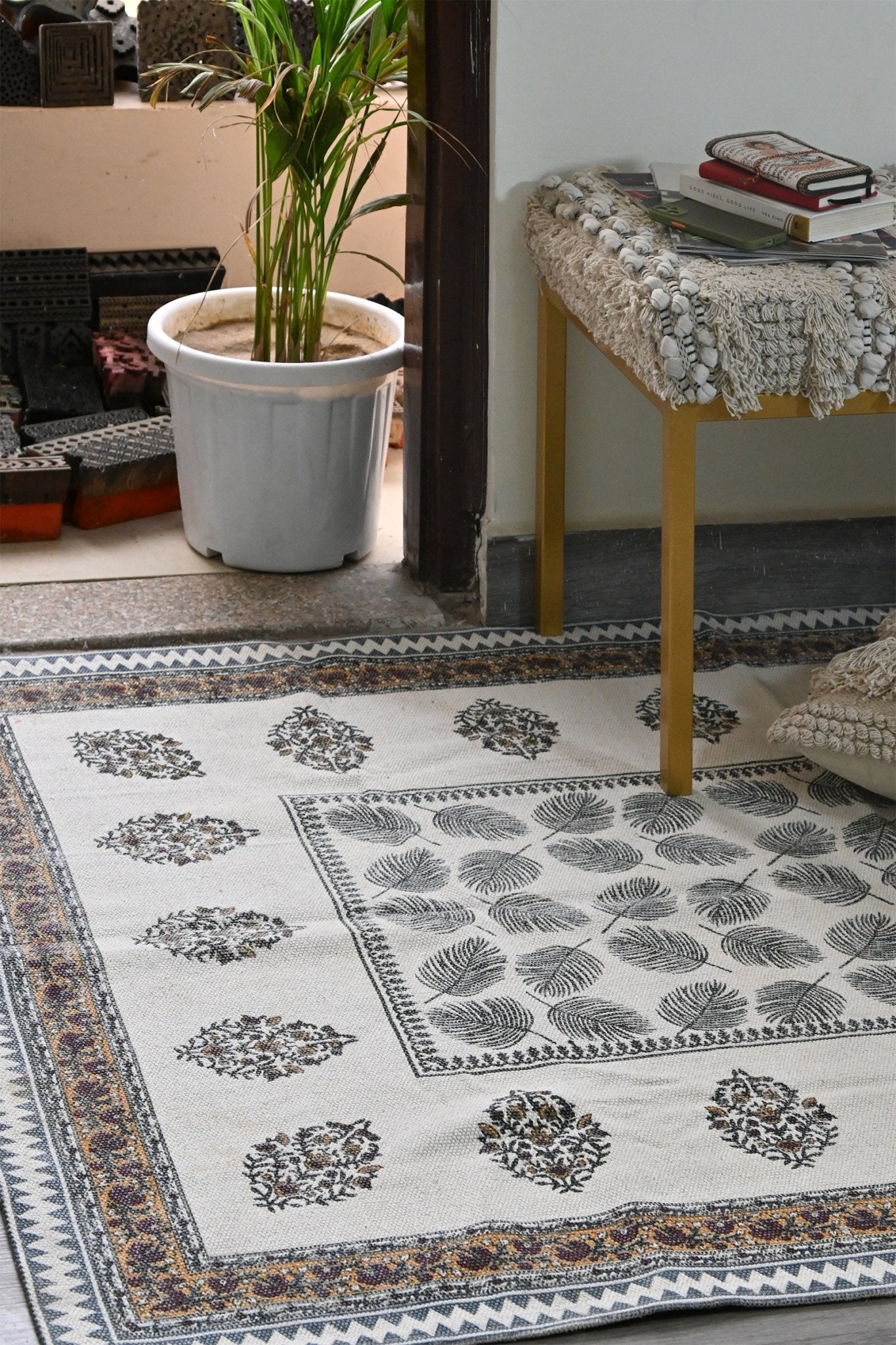 Detail of block-print on green dhurrie rug — Art Avenue