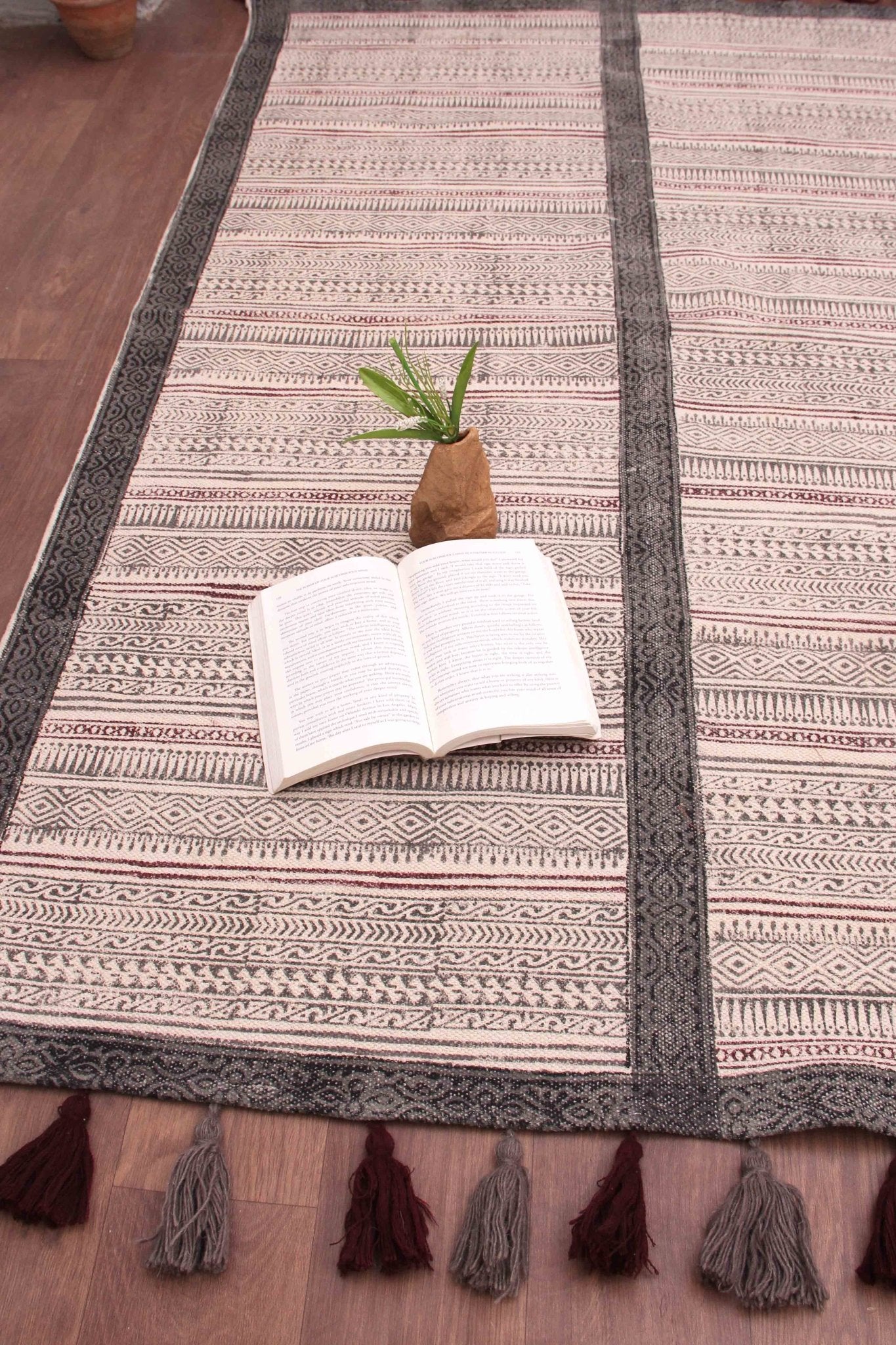 Detail of block-print on off white dhurrie rug — Art Avenue
