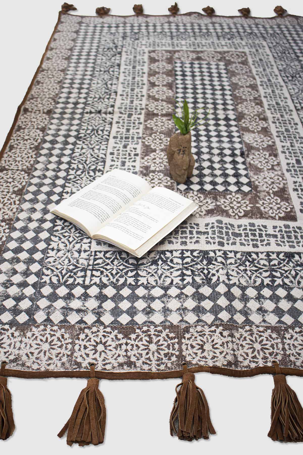 Detail of block-print on brown dhurrie rug — Art Avenue