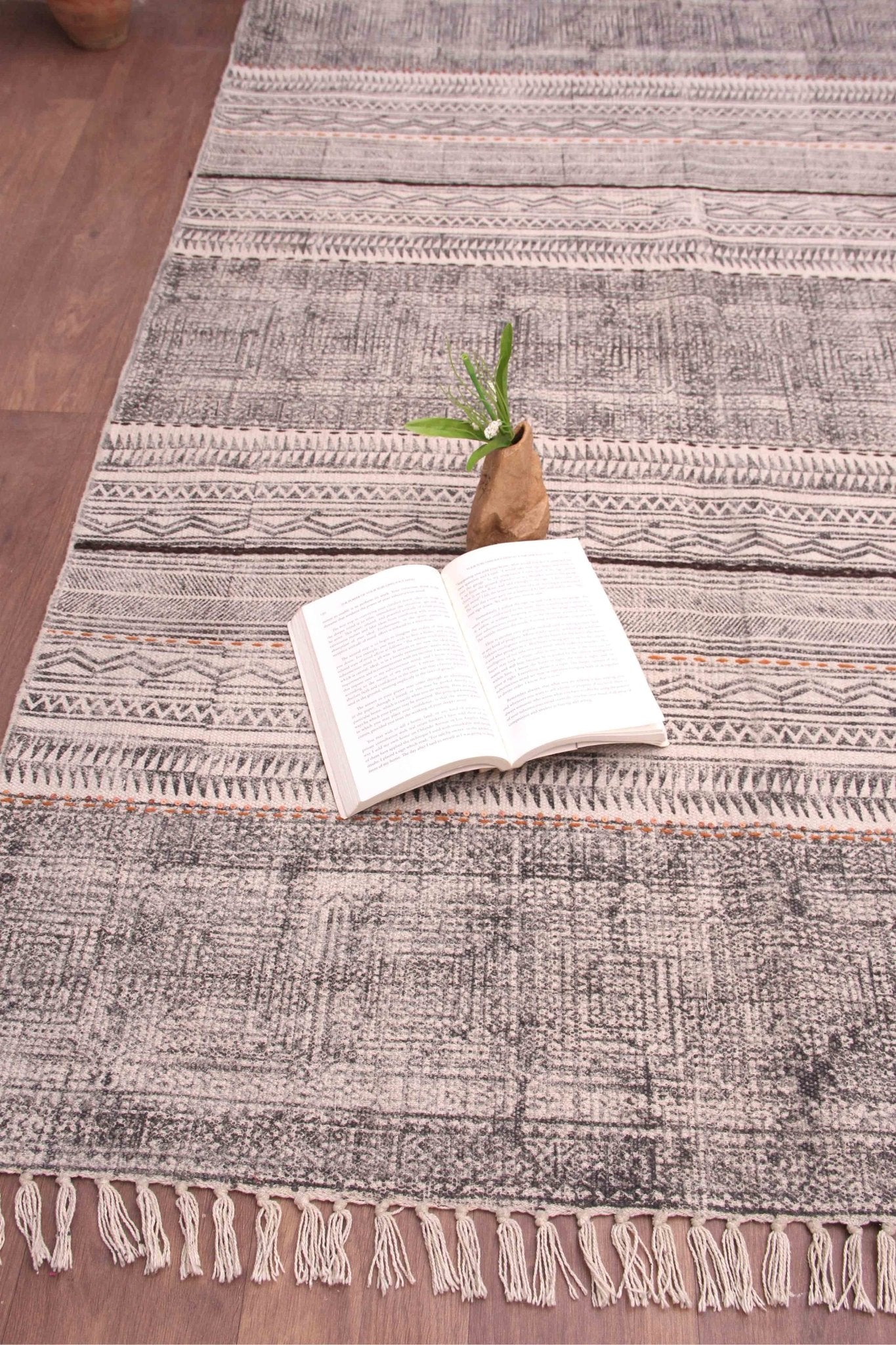 Block-printed cotton dhurrie rug in room setting — Art Avenue