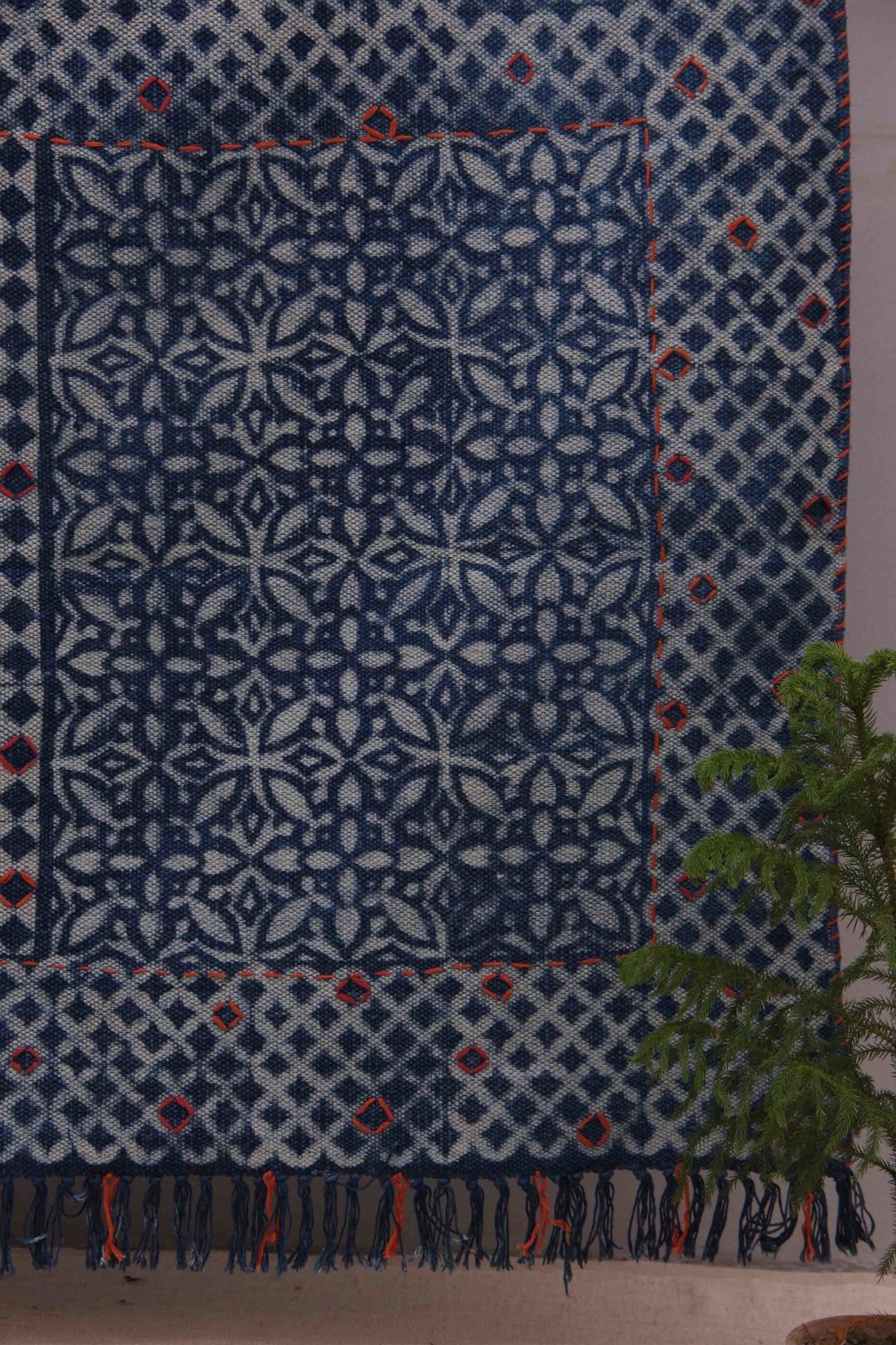 Block-printed cotton dhurrie rug in room setting — Art Avenue
