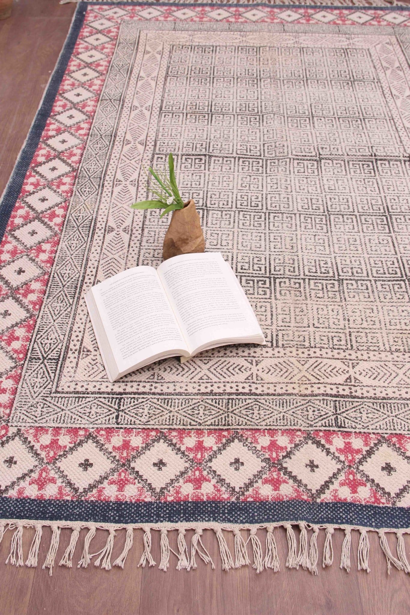 Detail of block-print on black dhurrie rug — Art Avenue
