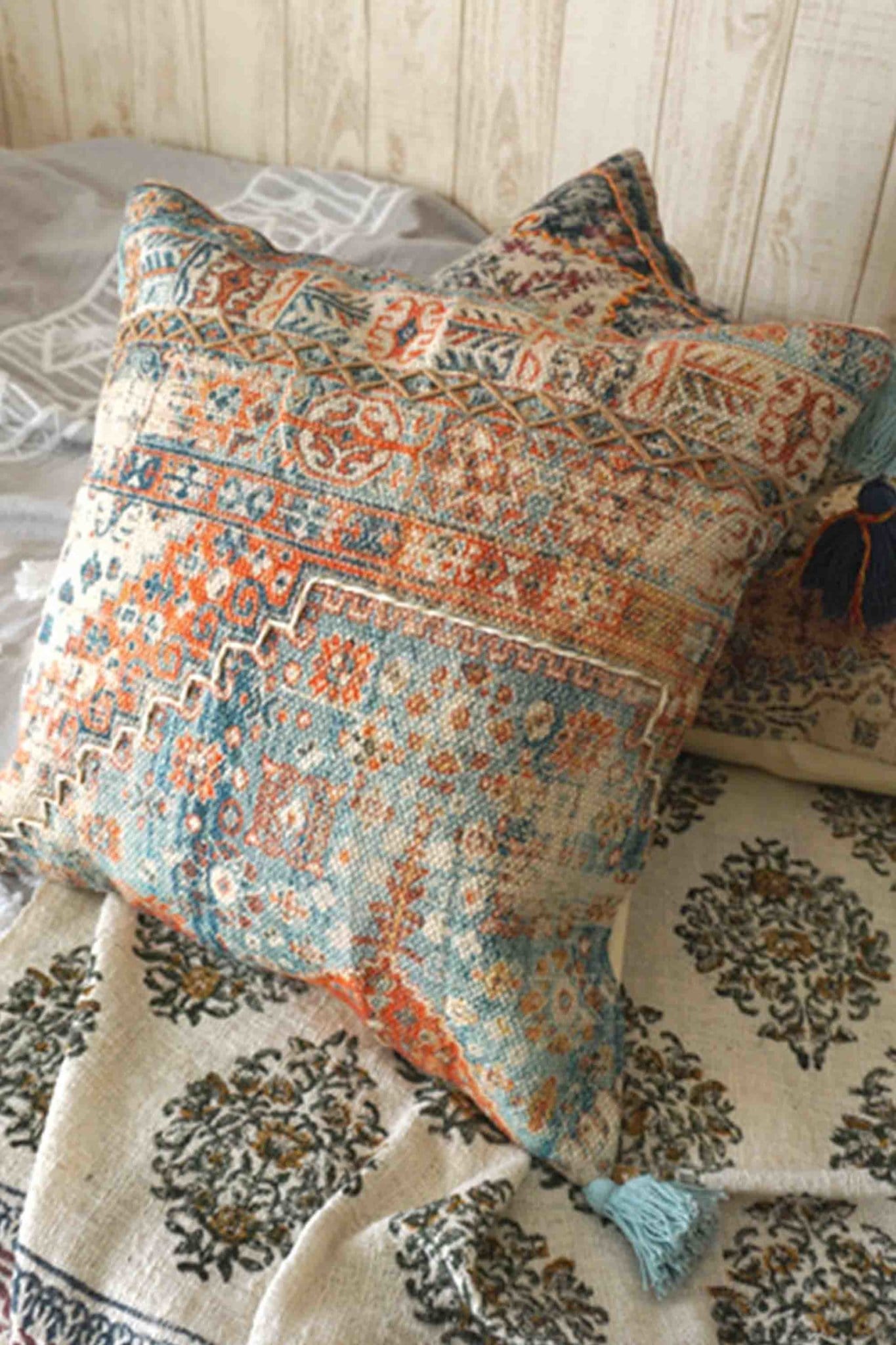 Block-printed square cushion on sofa — Art Avenue