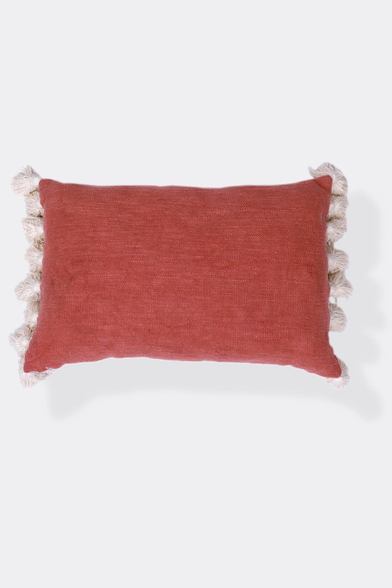 Overdyed lumbar cushion on sofa — Art Avenue