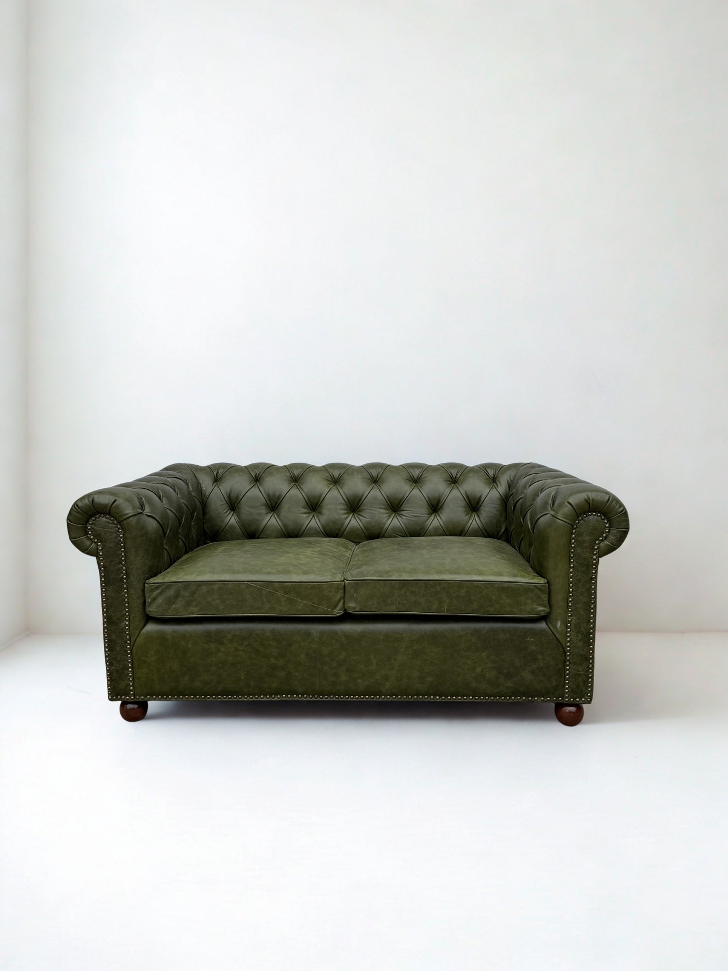 Handcrafted leather chesterfield sofa — Art Avenue