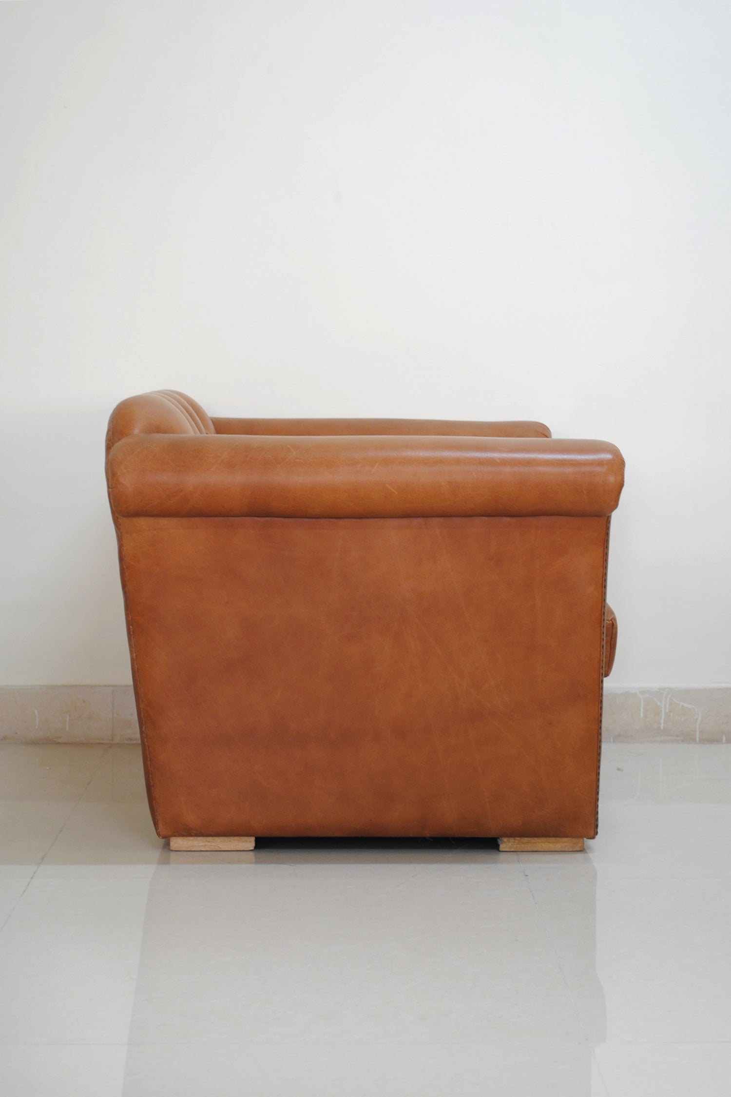 Handcrafted leather wing back armchair — Art Avenue