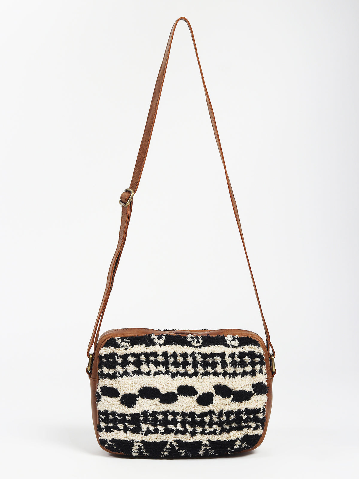 Archer sling bag on model — Art Avenue