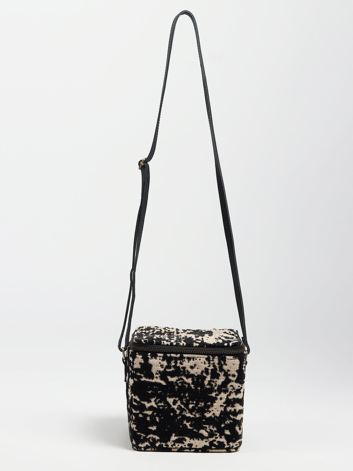 Alira leather and jacquard sling bag — Art Avenue