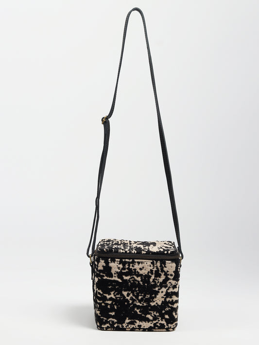 Alira leather and jacquard sling bag — Art Avenue