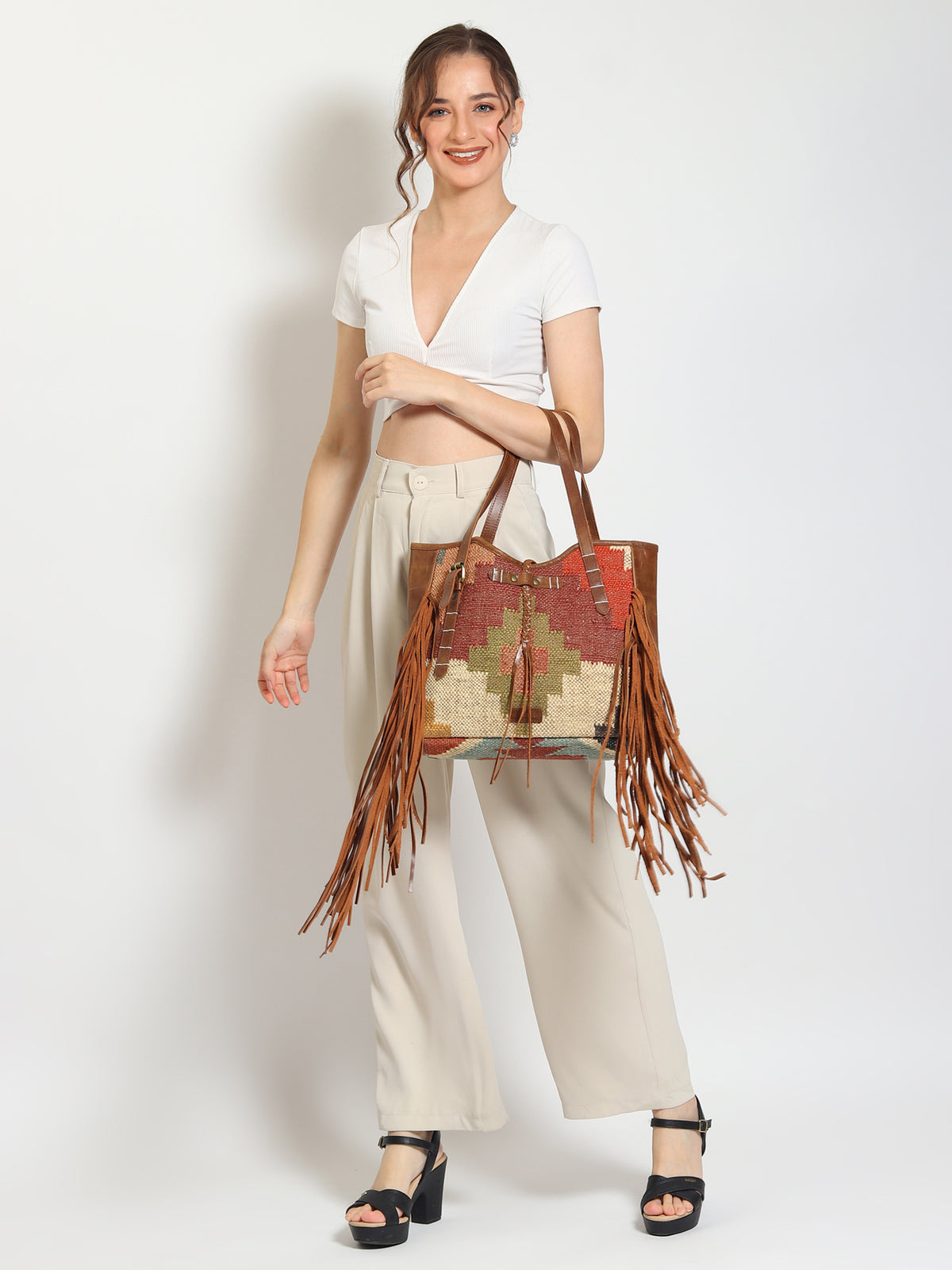 Bohemian kilim and leather handbag, side view — Art Avenue