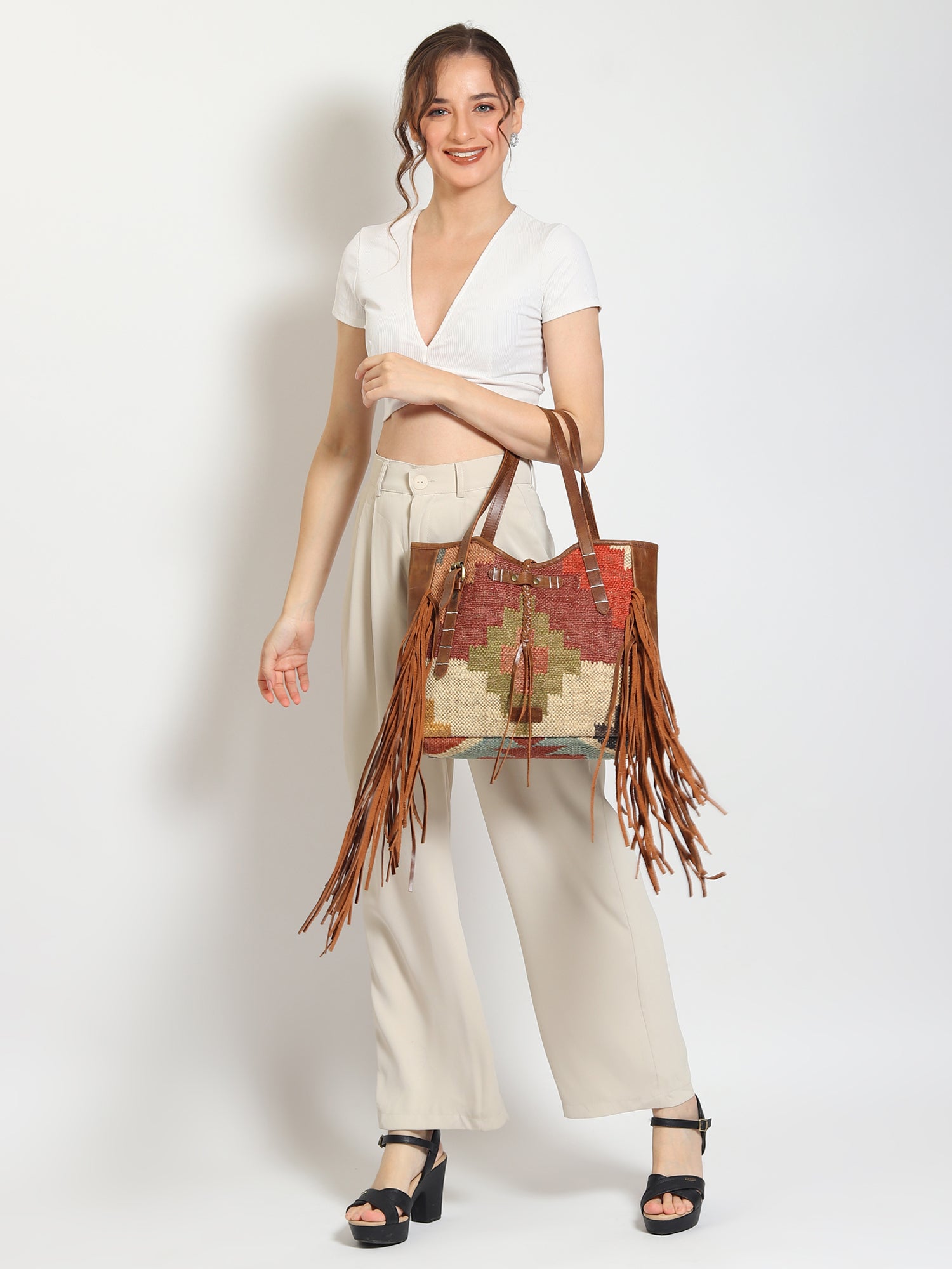 Bohemian kilim and leather handbag, side view — Art Avenue
