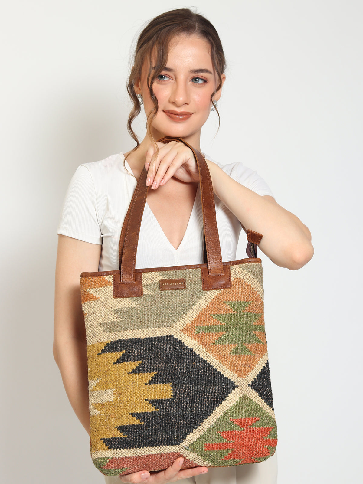 Camelia kilim and leather handbag, side view — Art Avenue