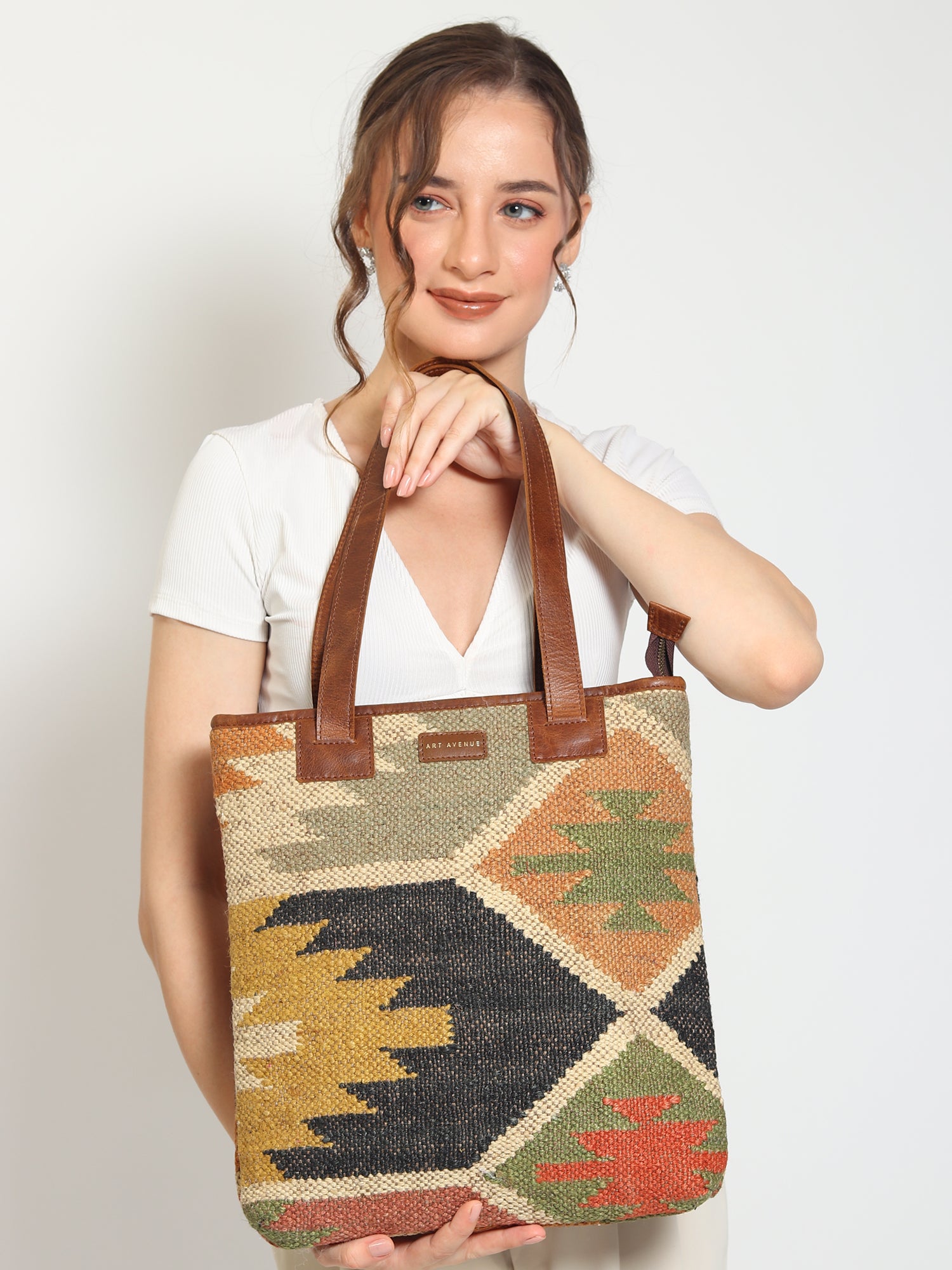 Camelia kilim and leather handbag, side view — Art Avenue