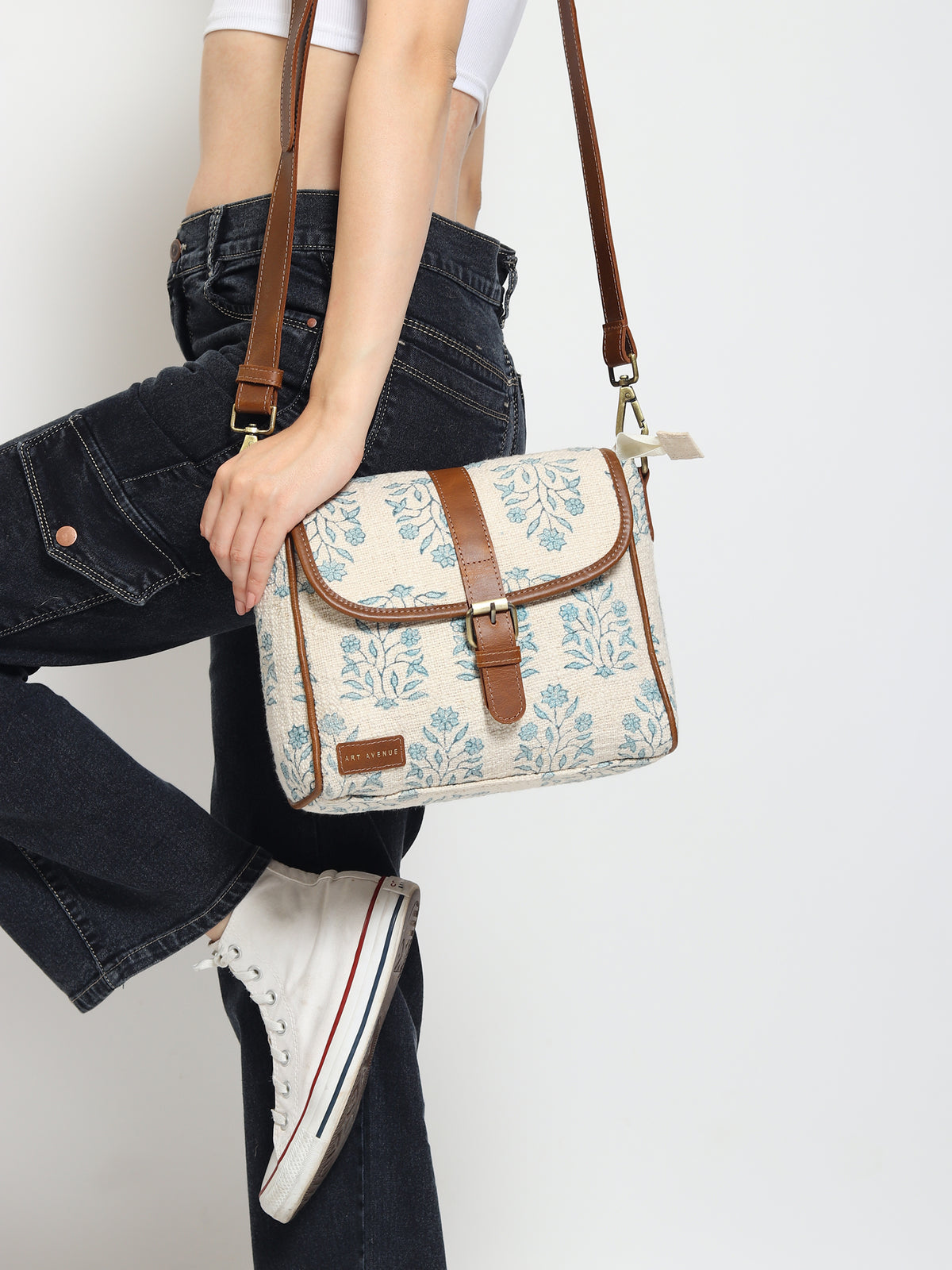 Carter block-printed and leather sling bag — Art Avenue