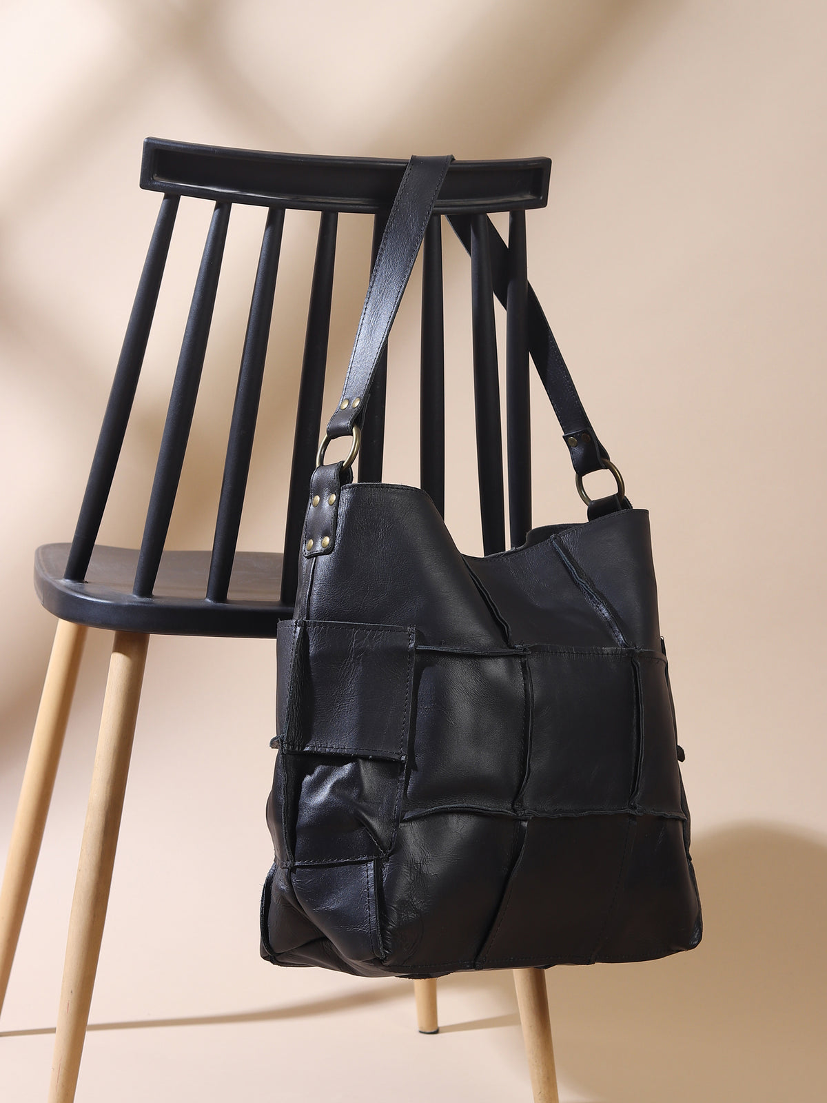 Blazon patchwork handbag detail — Art Avenue